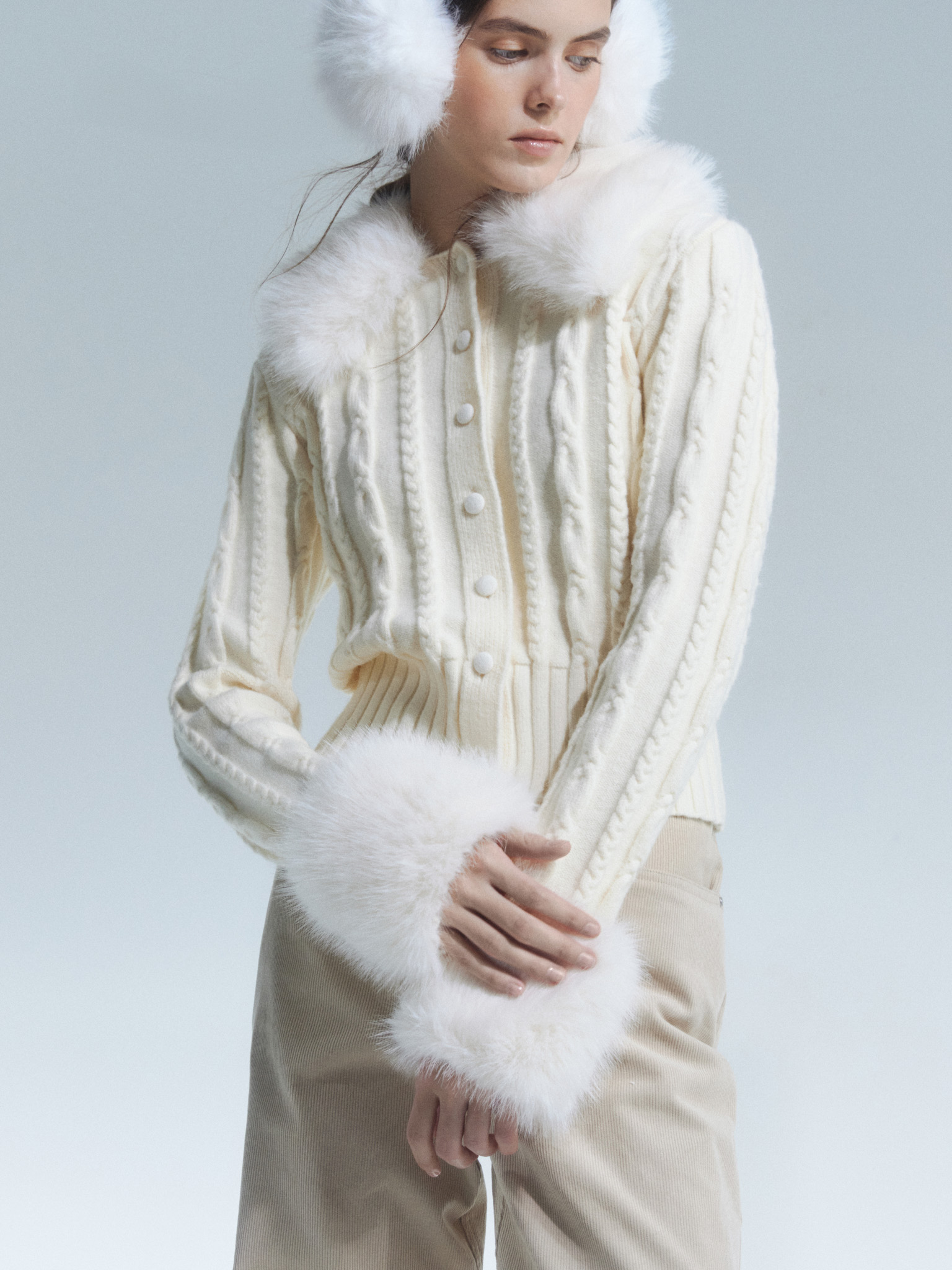 Cable-knit cardigan with eco-fur trim