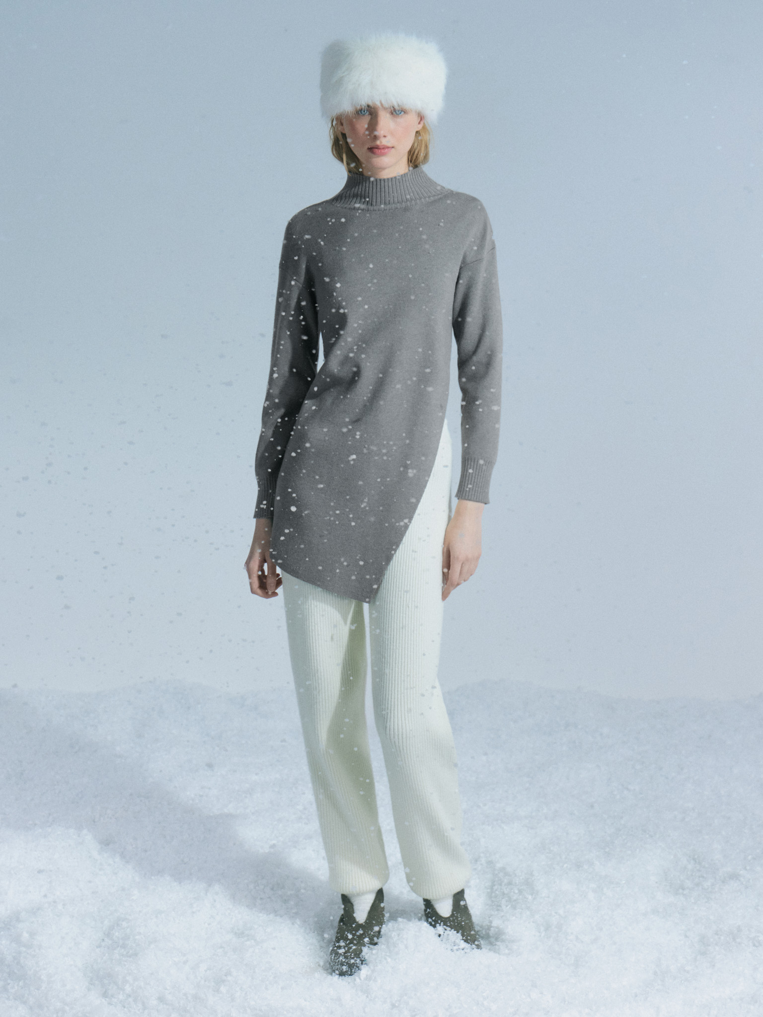 Smooth-knit jumper with asymmetrical hem