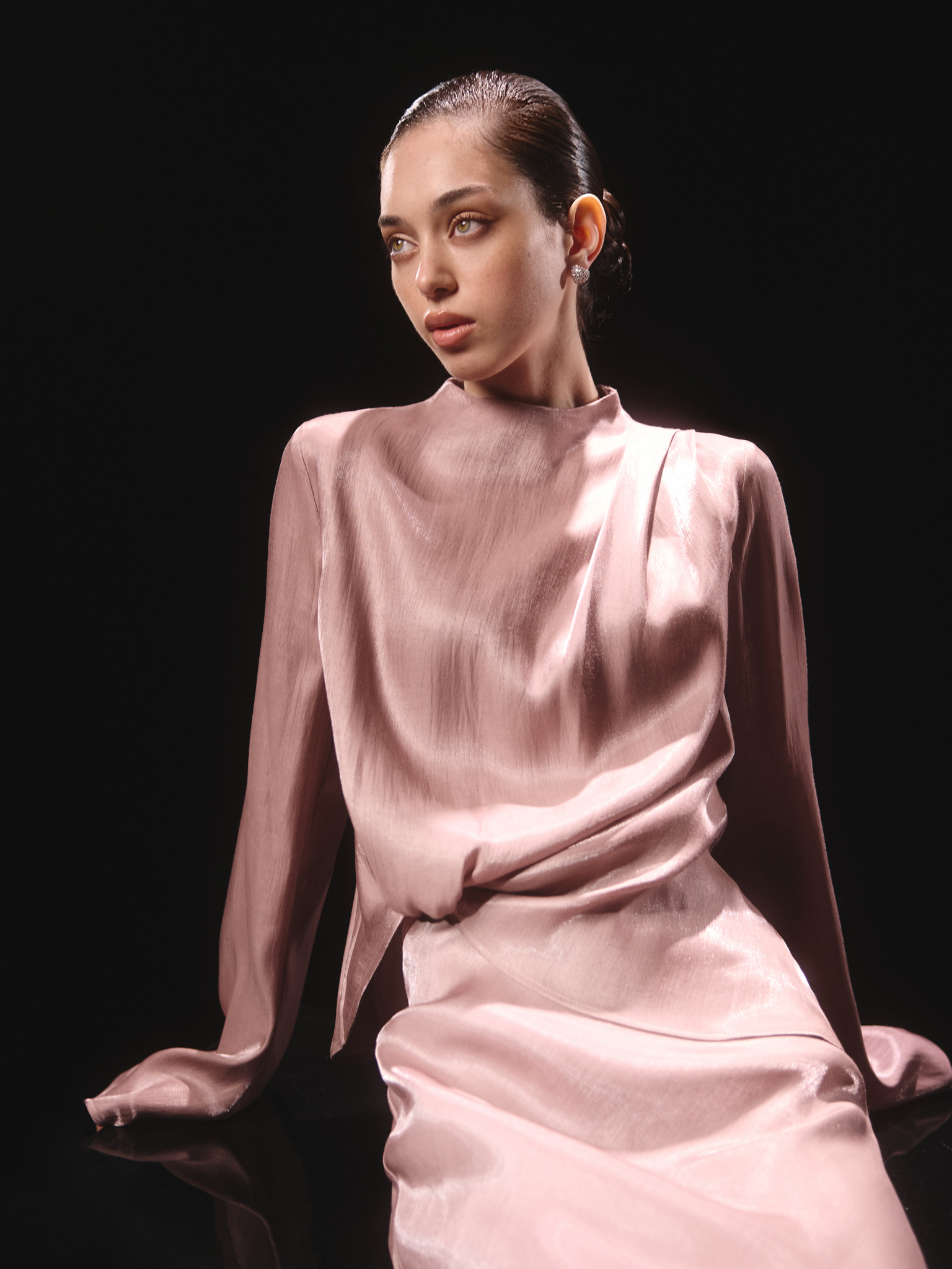 Asymmetrical blouse in shiny fabric