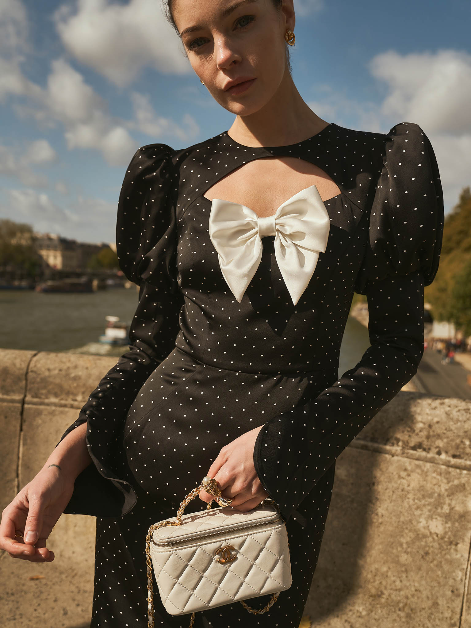 Polka dot midi dress with bow on the bodice