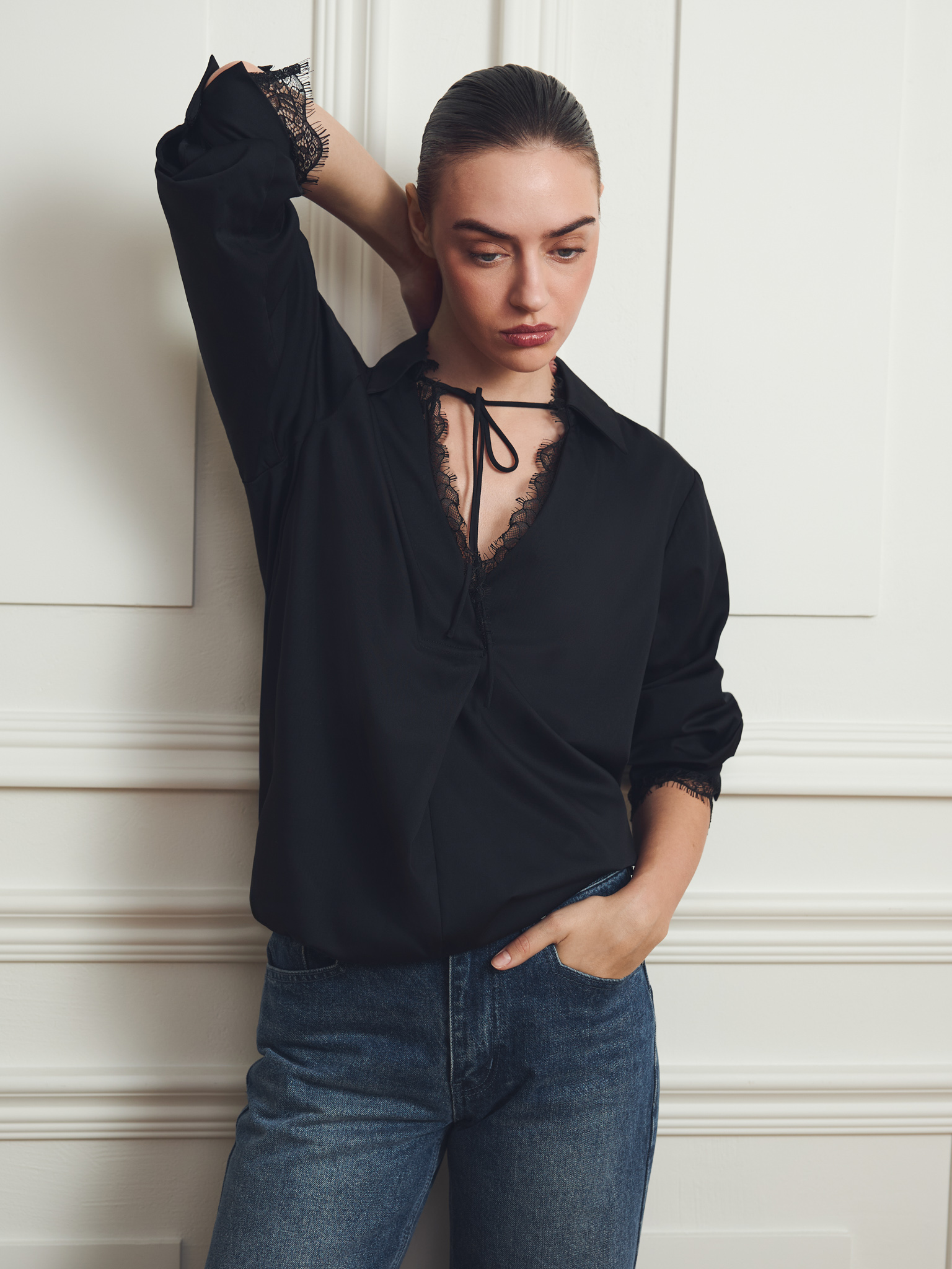 Blouse with lace trim and ties at the collar