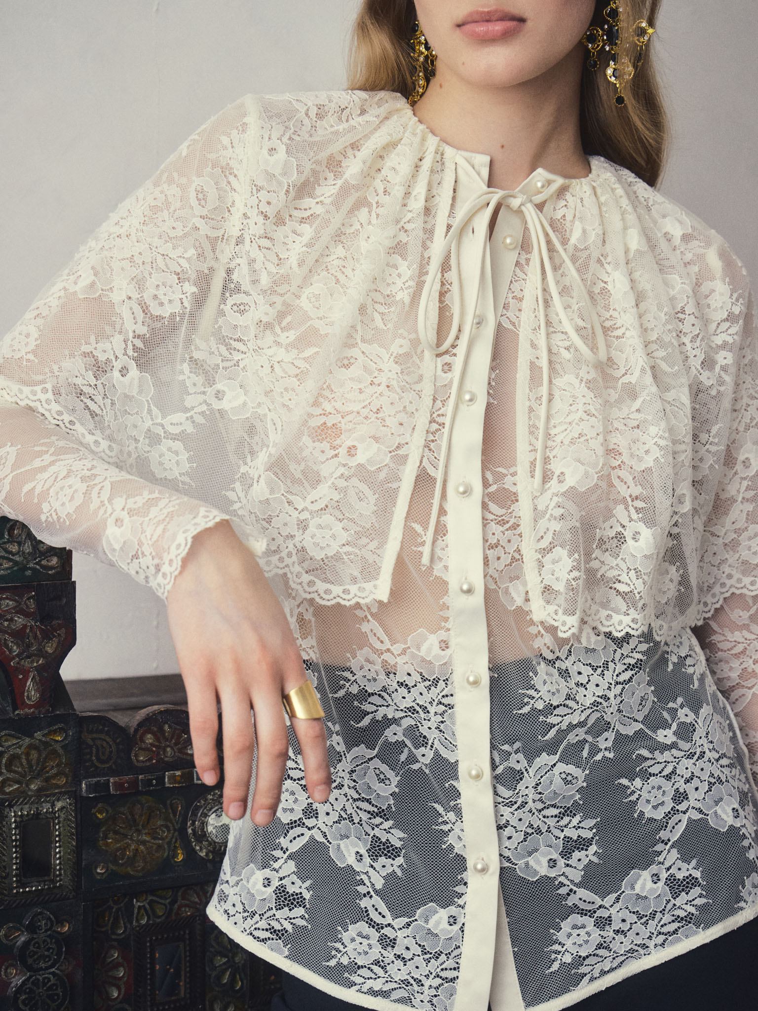 Guipure lace blouse with voluminous cape