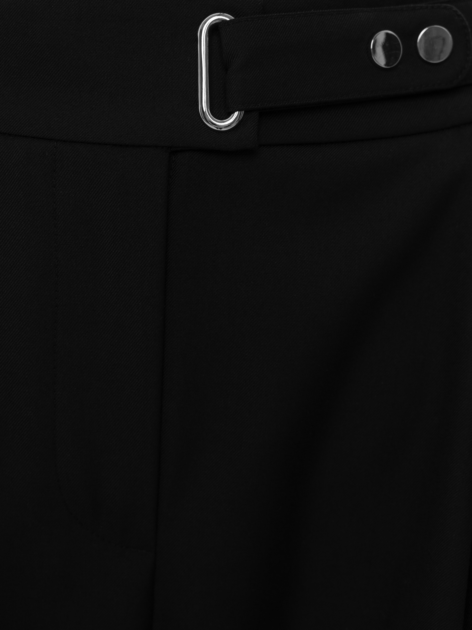 Loose-fit trousers with asymmetrical fastening