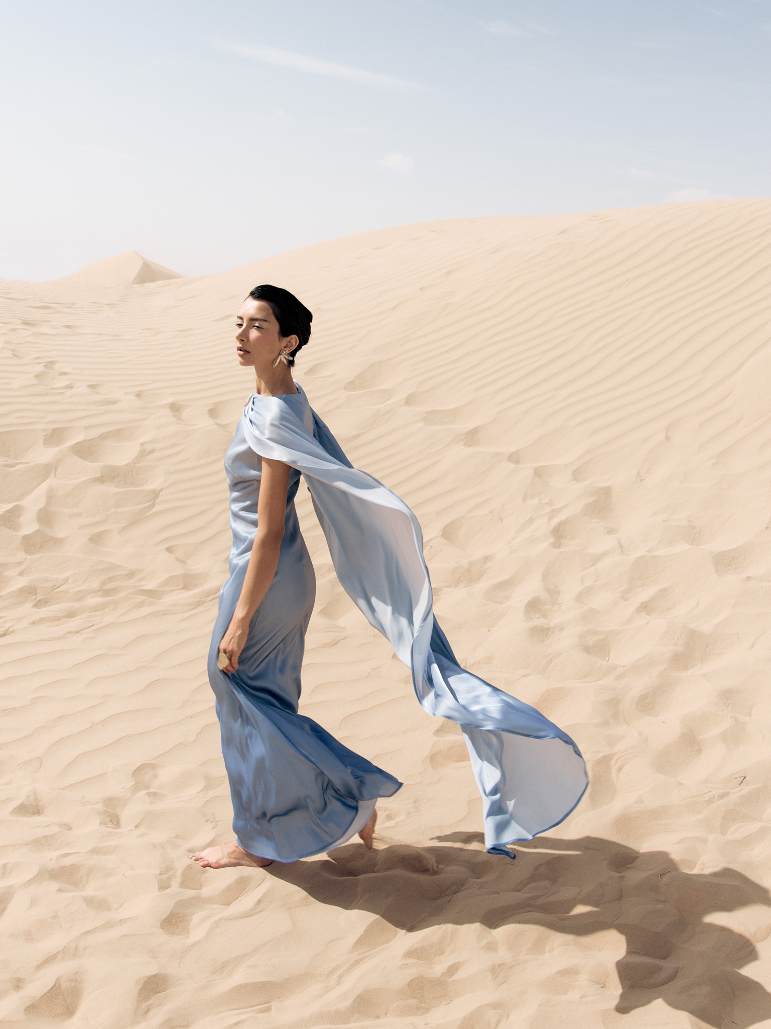 Shimmering maxi dress with cape and metallic detailing