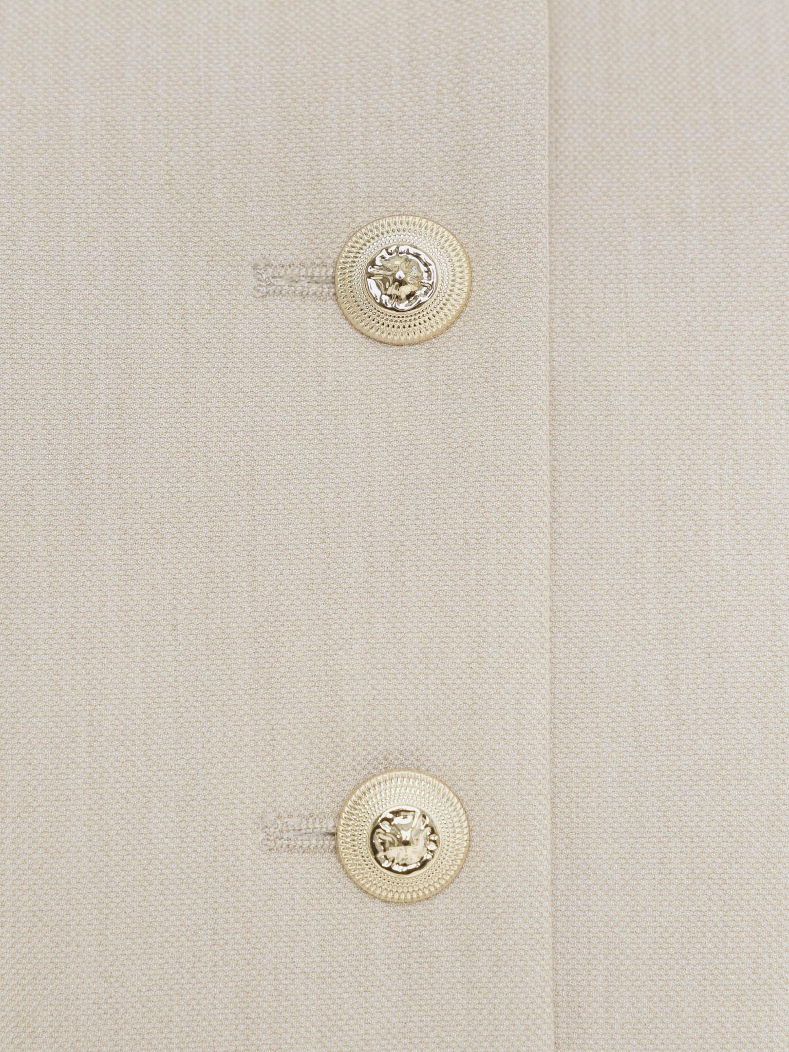 Jacket with short sleeves and oversized buttons