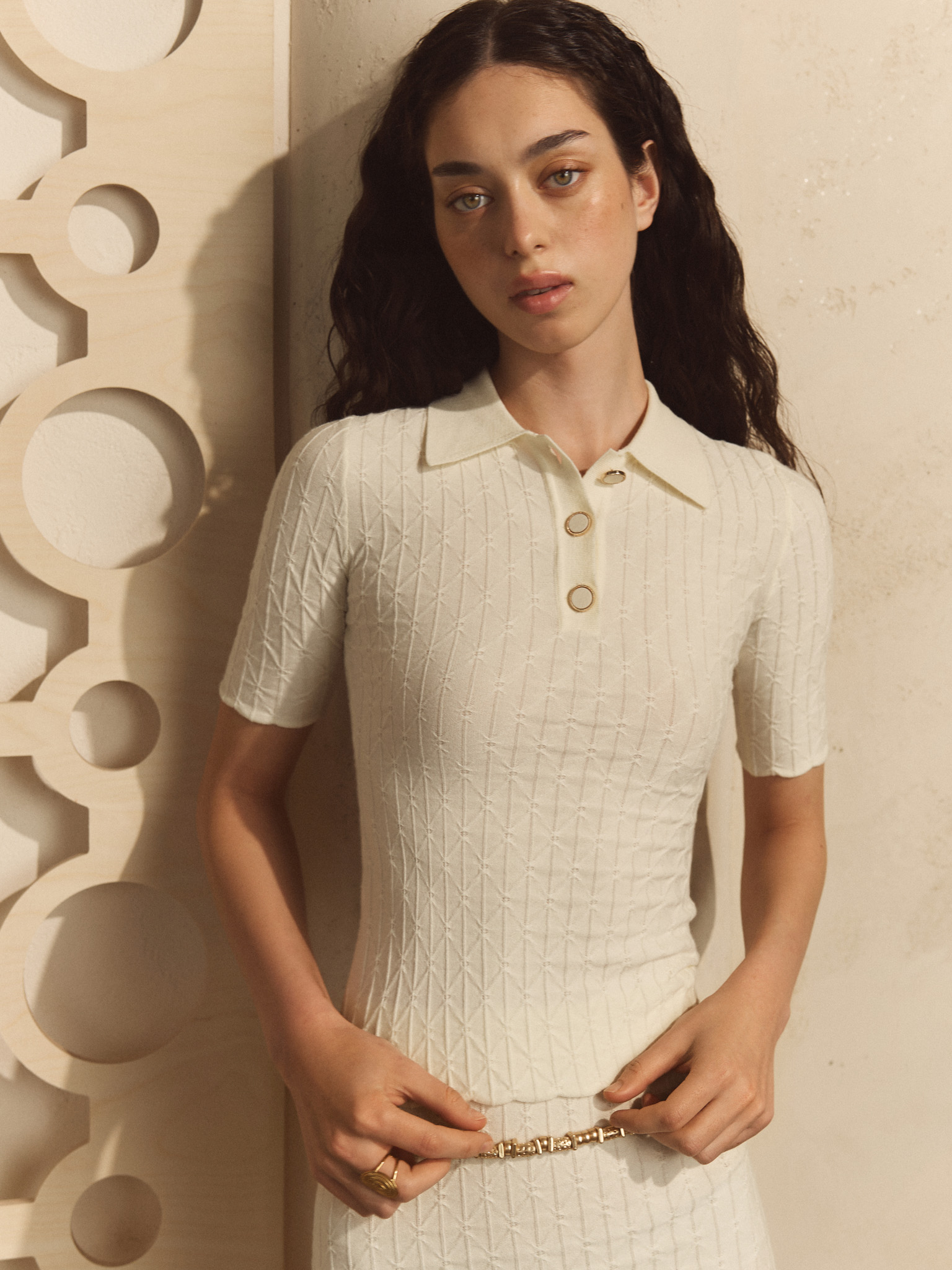 Polo shirt in textured knit with large buttons