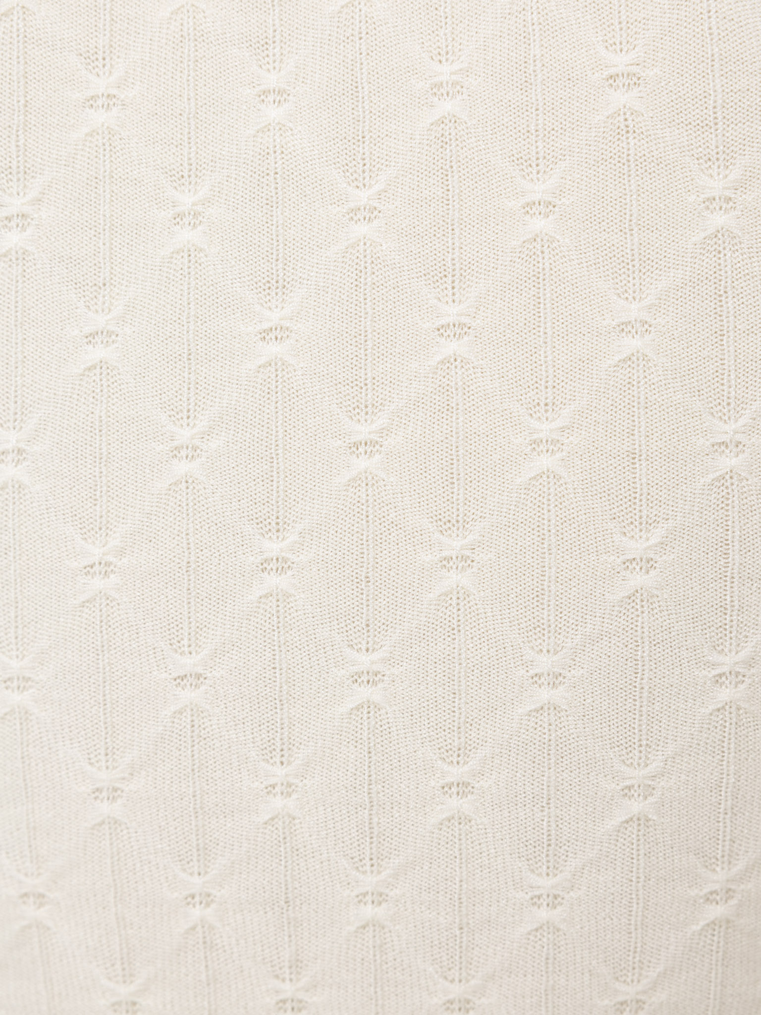 Polo shirt in textured knit with large buttons