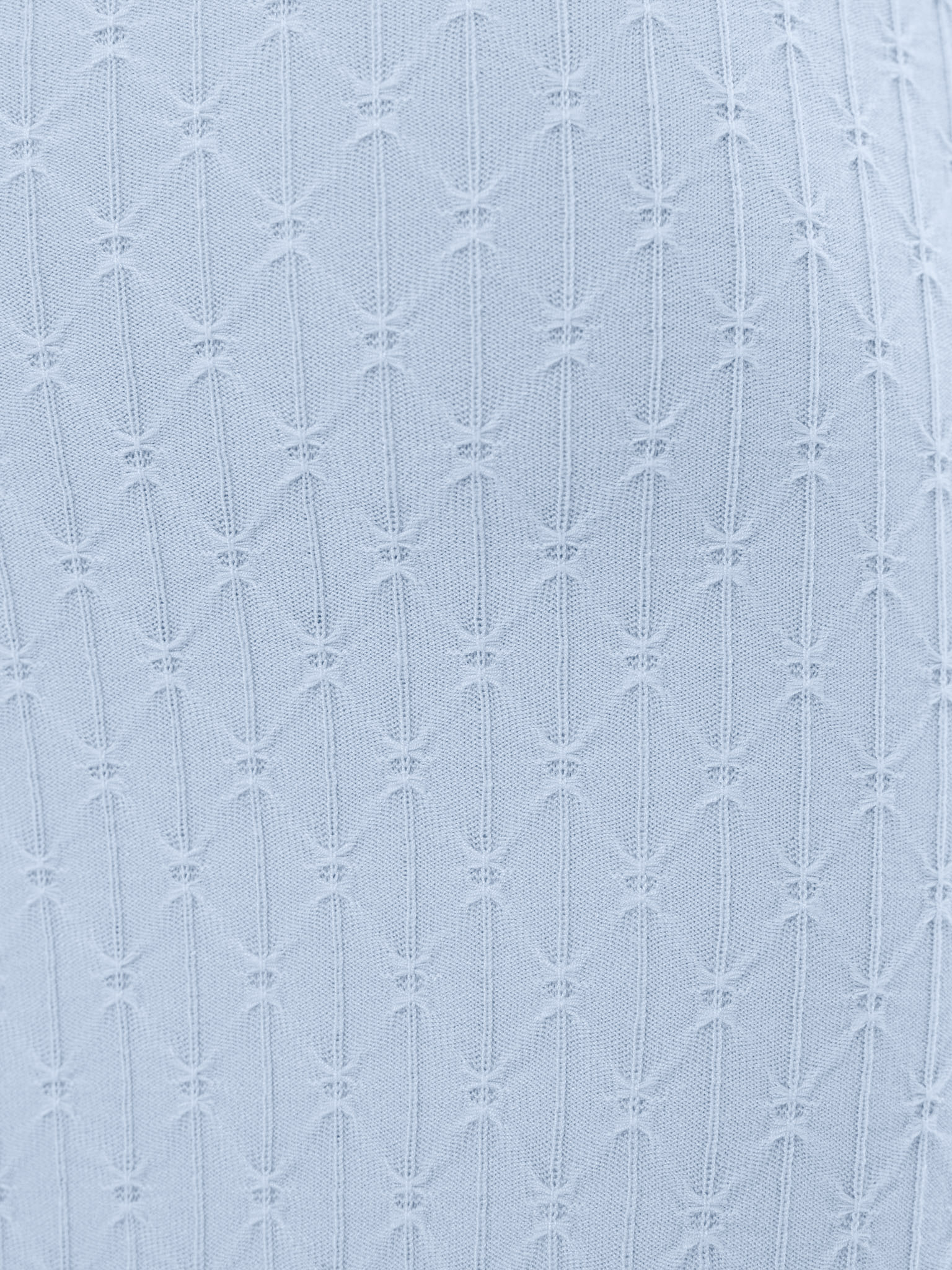 Polo shirt in textured knit with large buttons