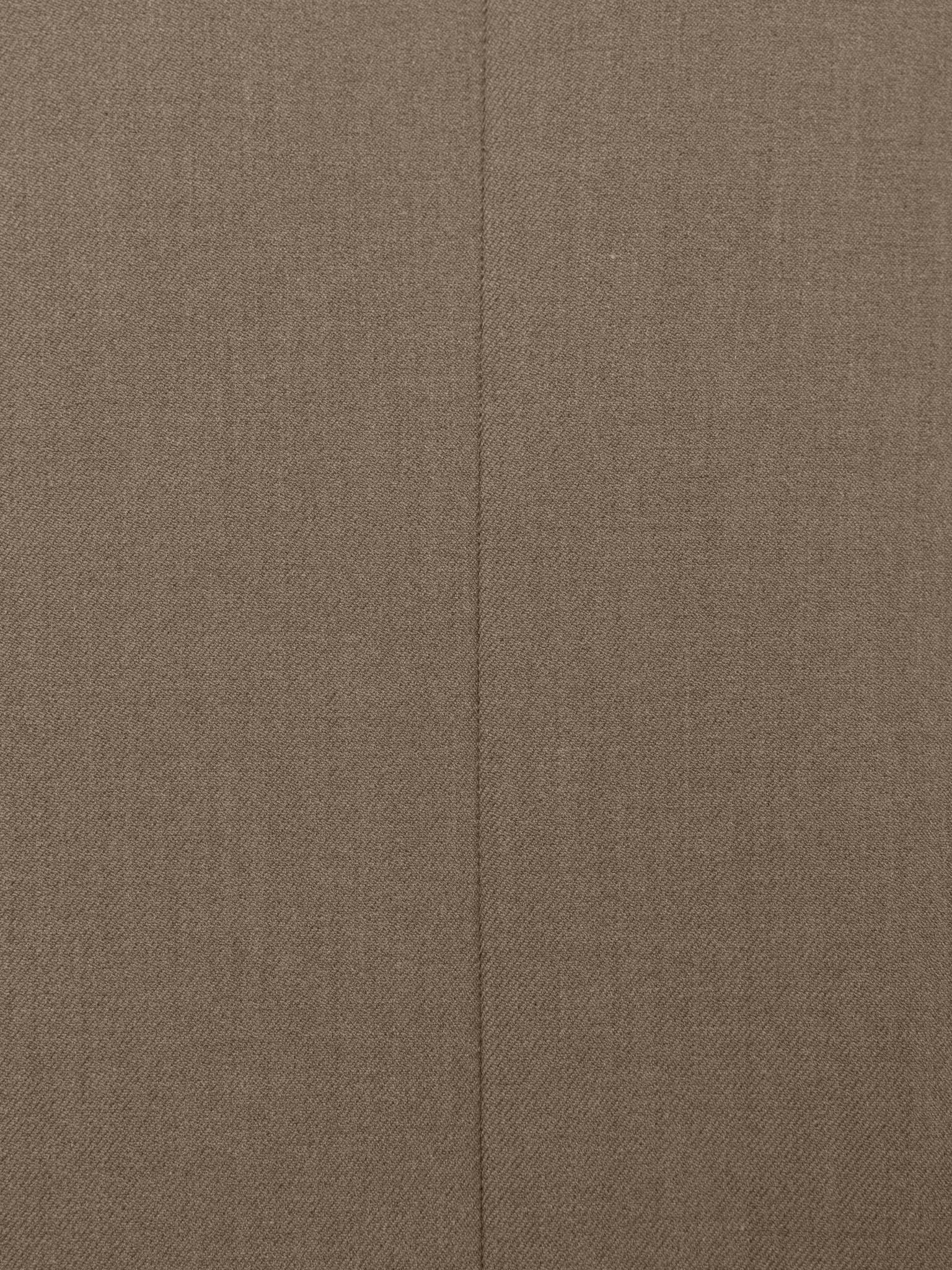 Loose single-breasted jacket with asymmetrical fastening