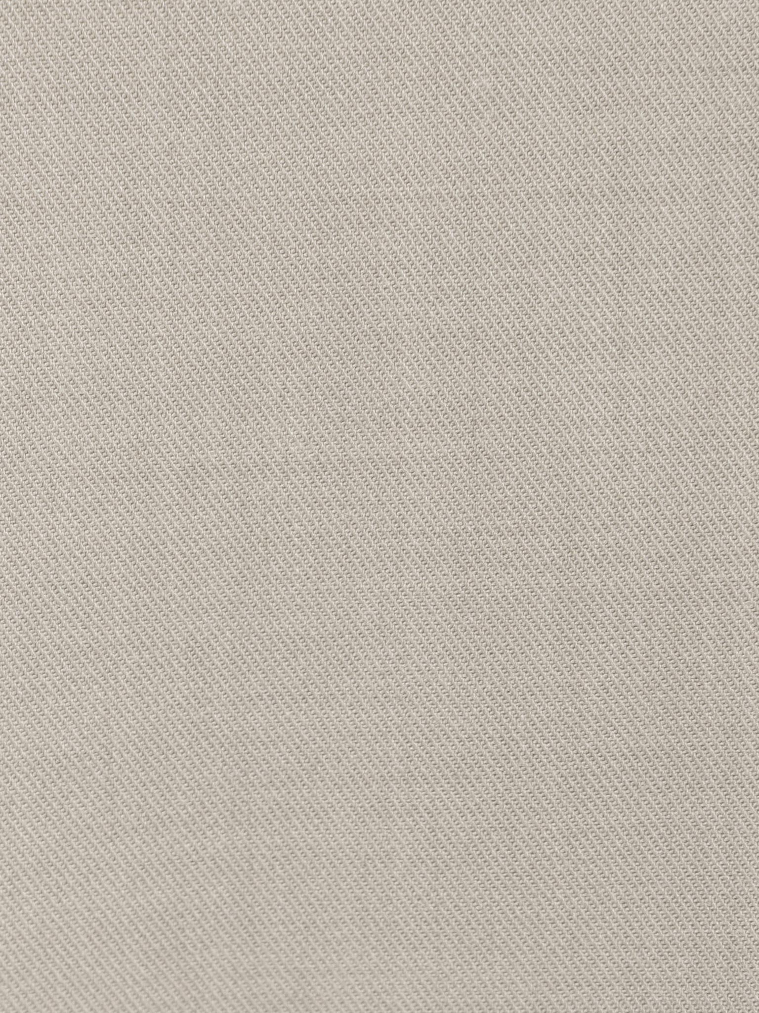 Loose-fitting trousers with buttons on the waistband