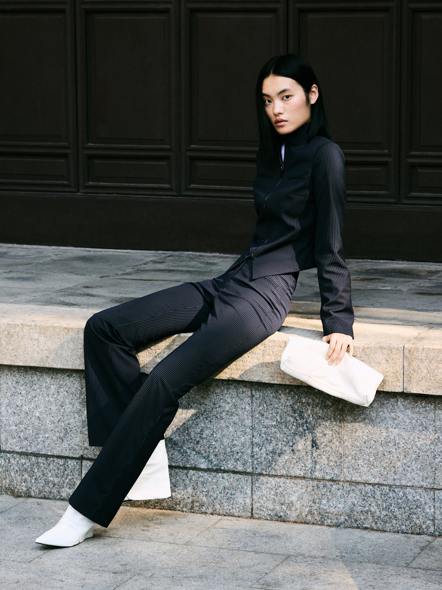 Fitted striped jacket with zip fastening