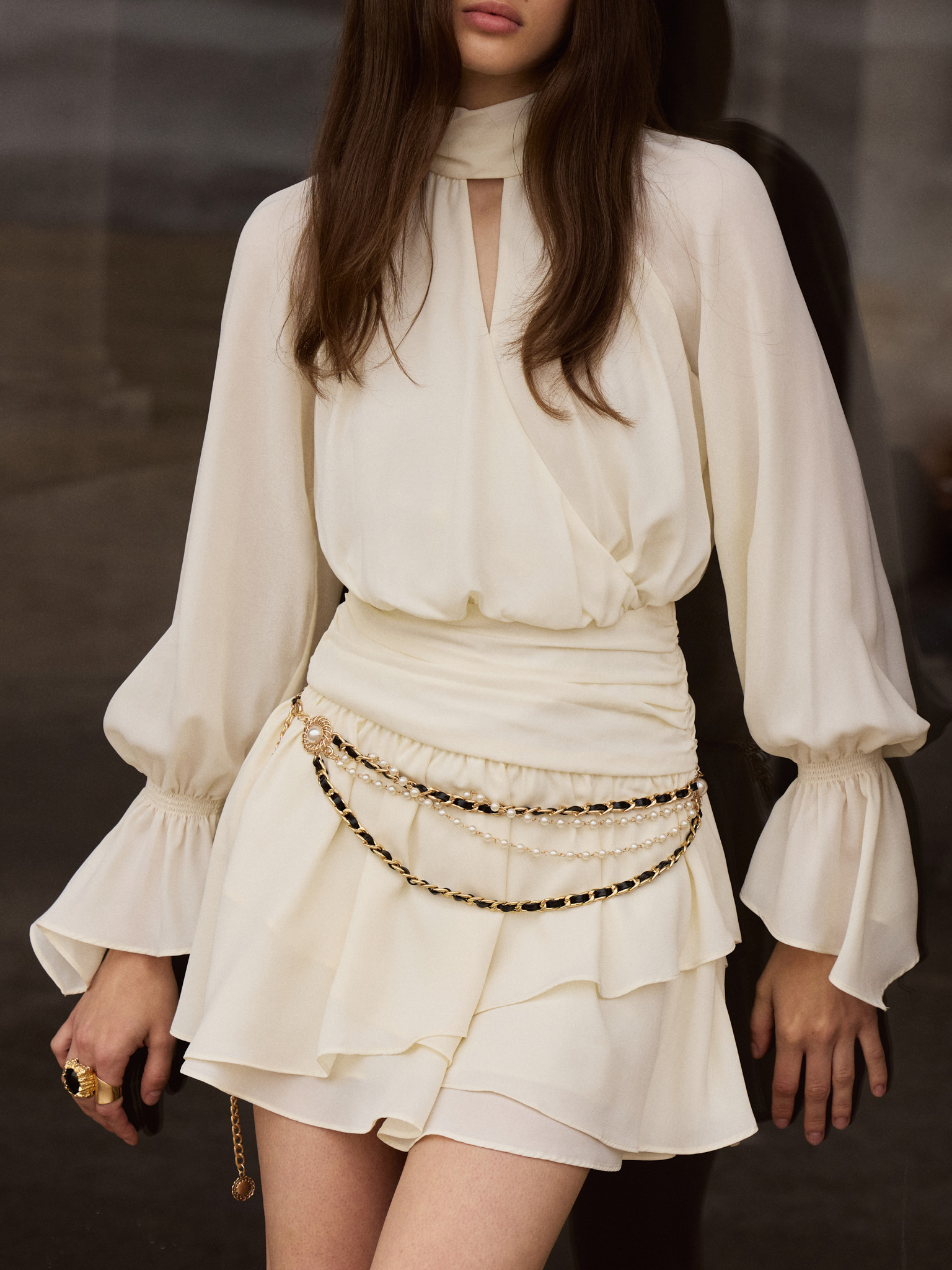 Mini dress with draped hips and layered skirt