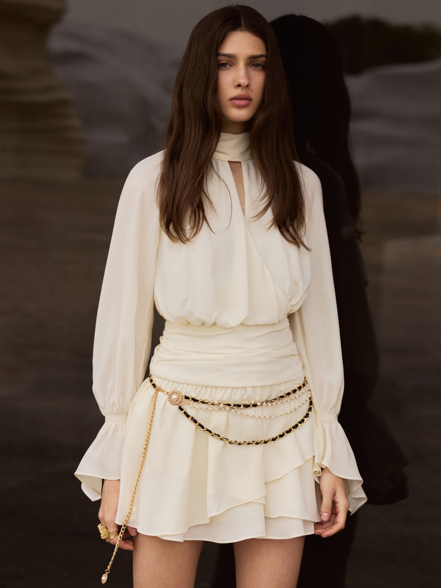 Mini dress with draped hips and layered skirt