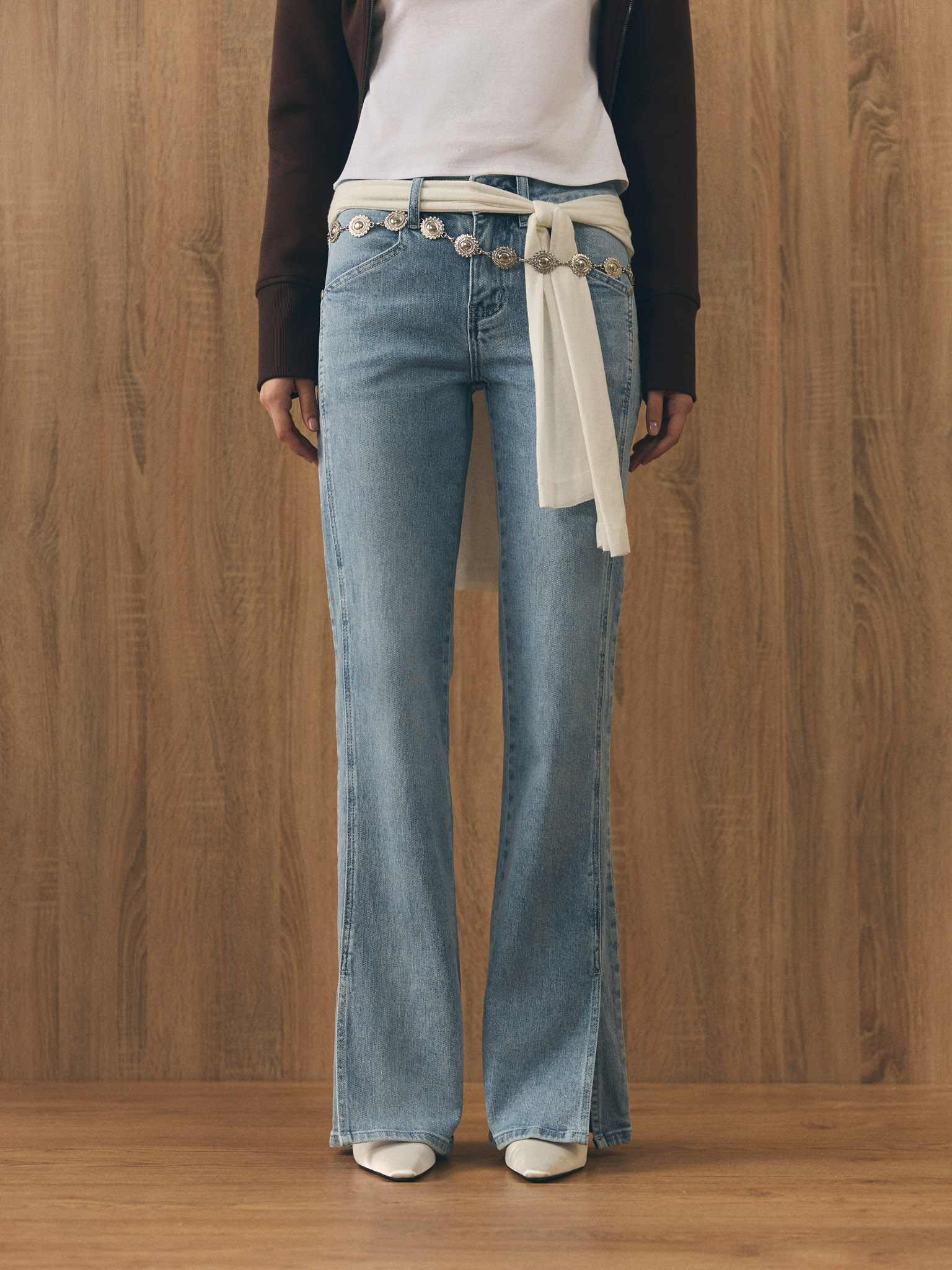 Flared jeans with slits on the sides