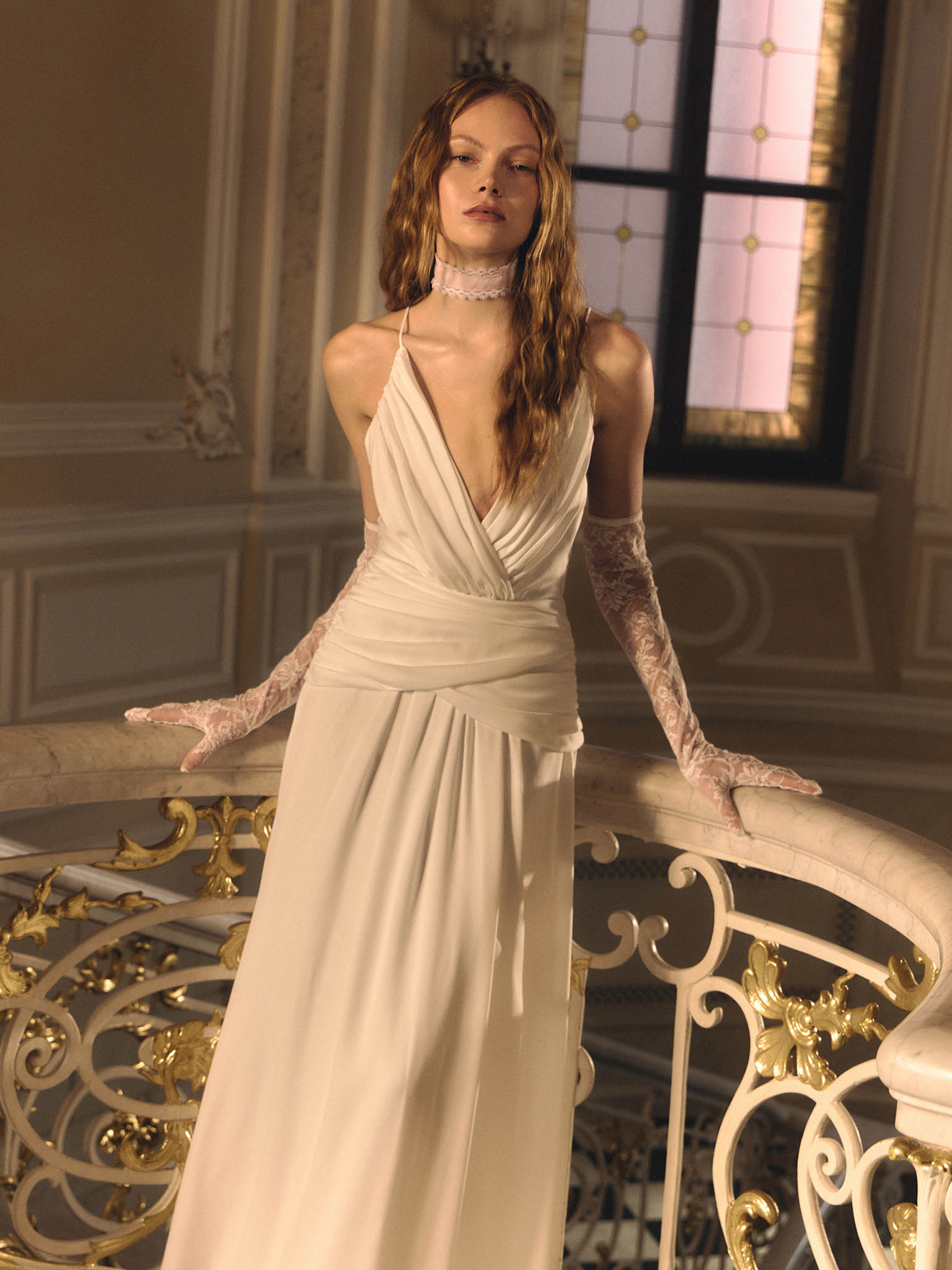 Maxi dress with thin straps and draping at the waist