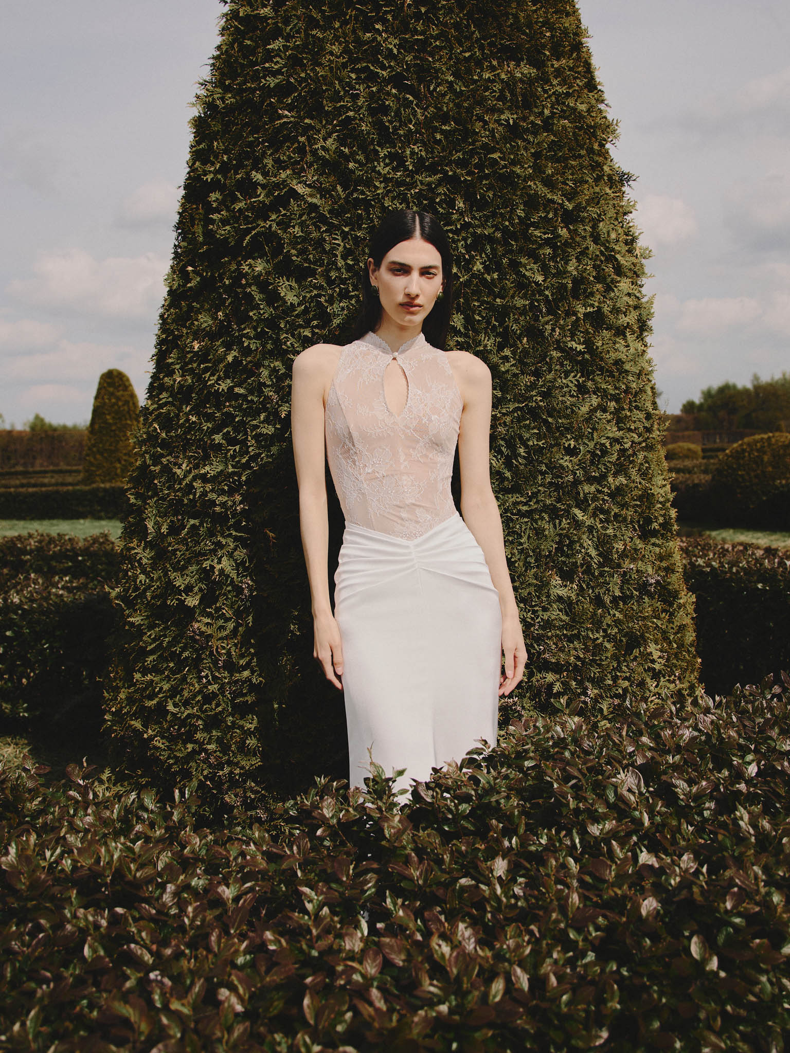 Maxi dress with a lace bodice and hip draping