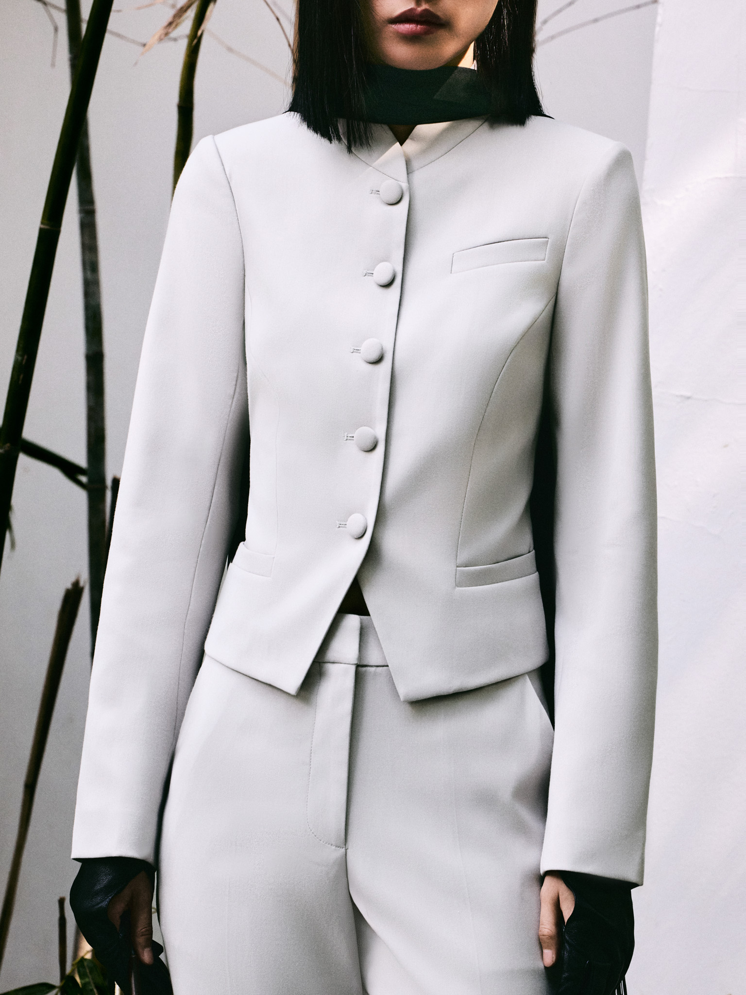 Fitted single-breasted jacket with covered buttons