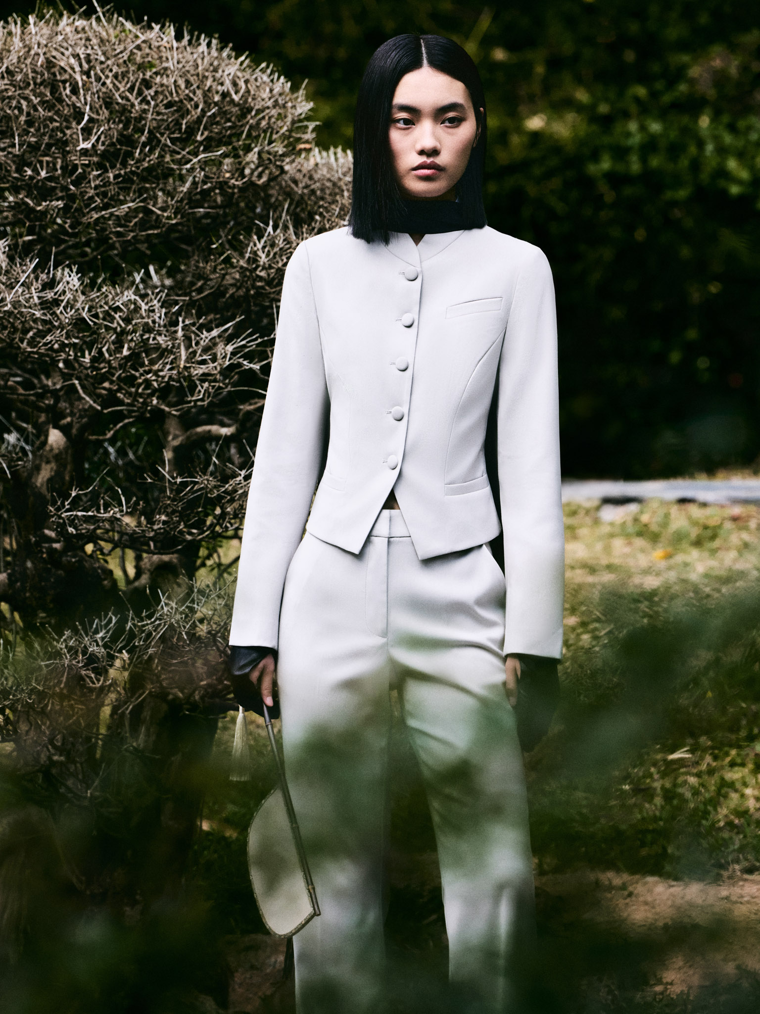 Fitted single-breasted jacket with covered buttons