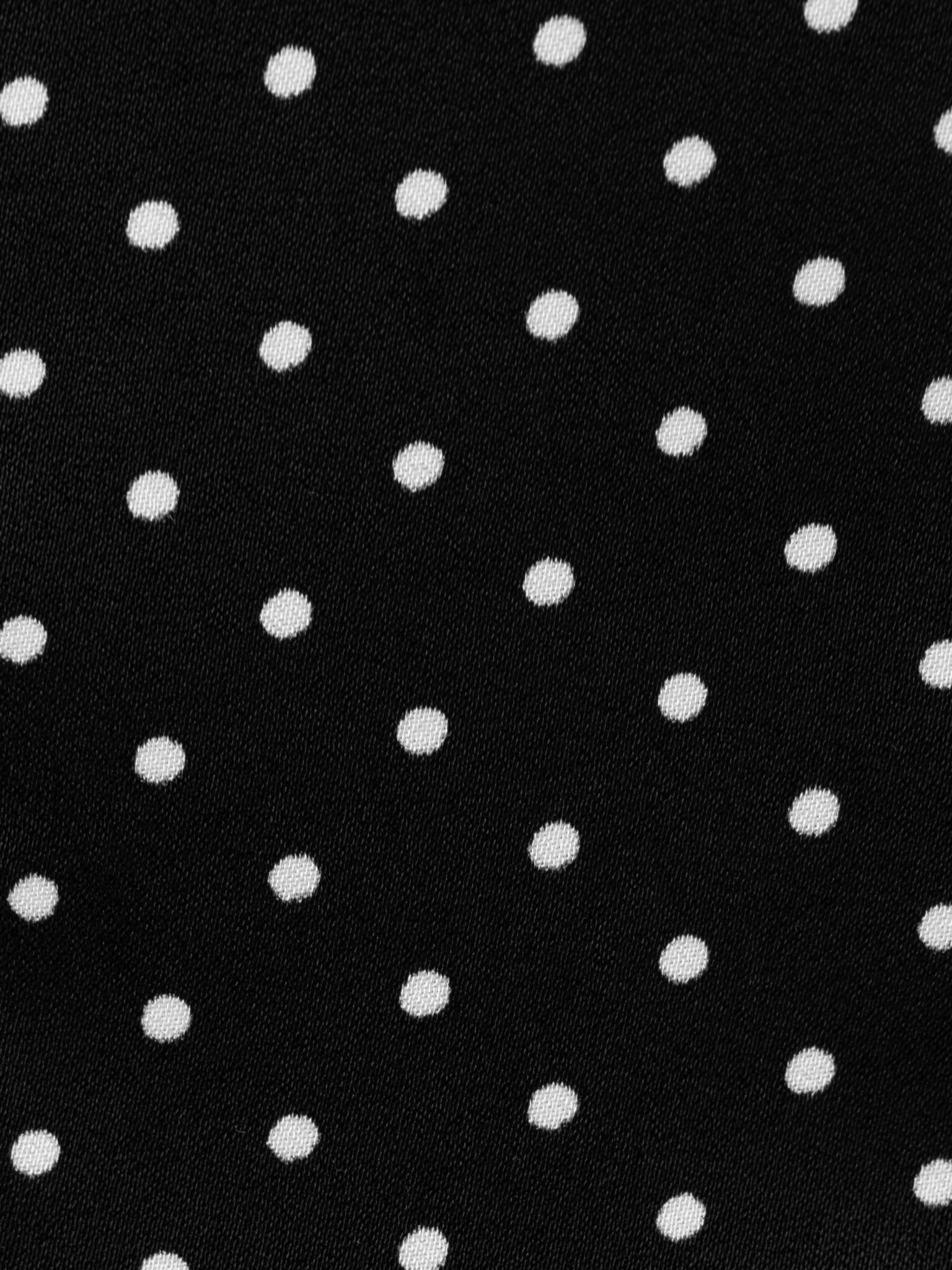 Polka dot blouse with a statement turn-down collar