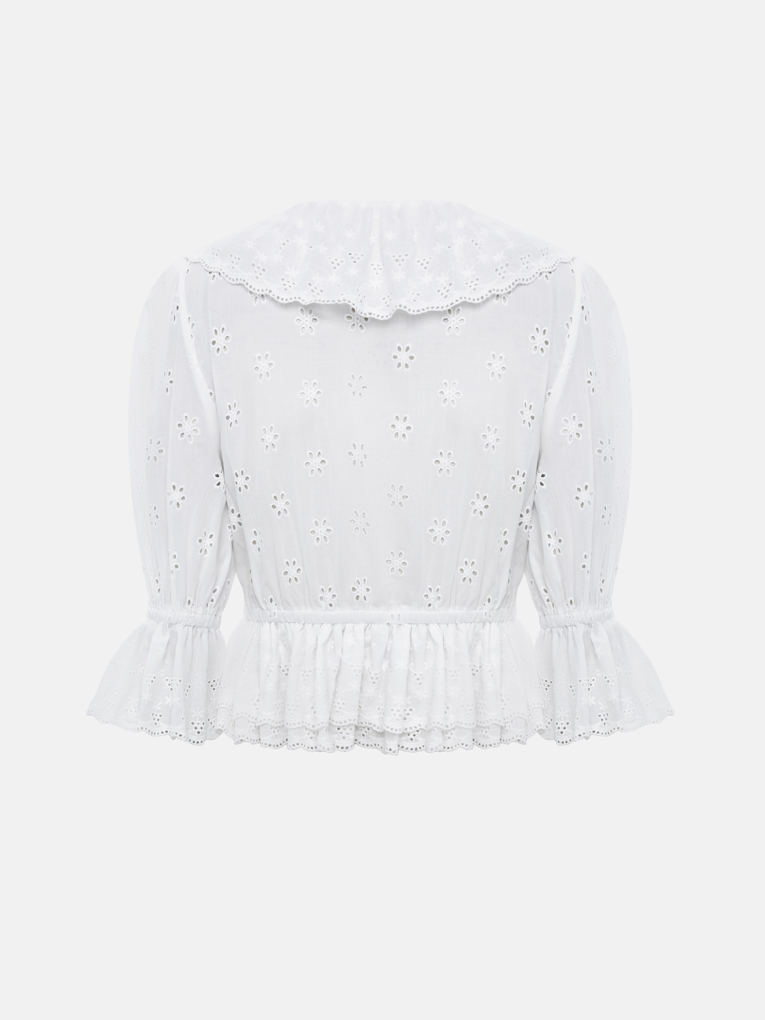Cotton blouse with ruffles and a floral pattern
