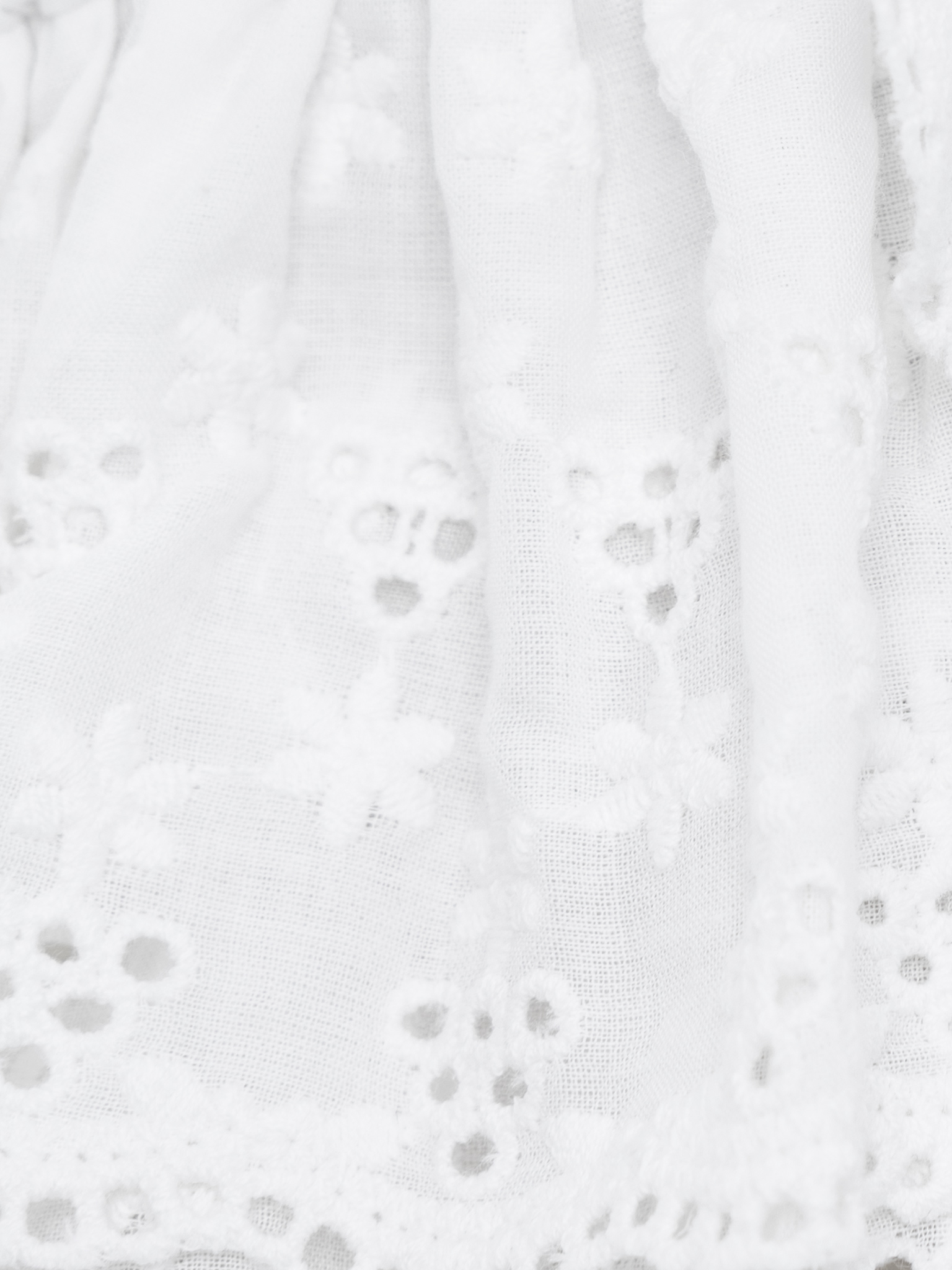 Cotton blouse with ruffles and a floral pattern