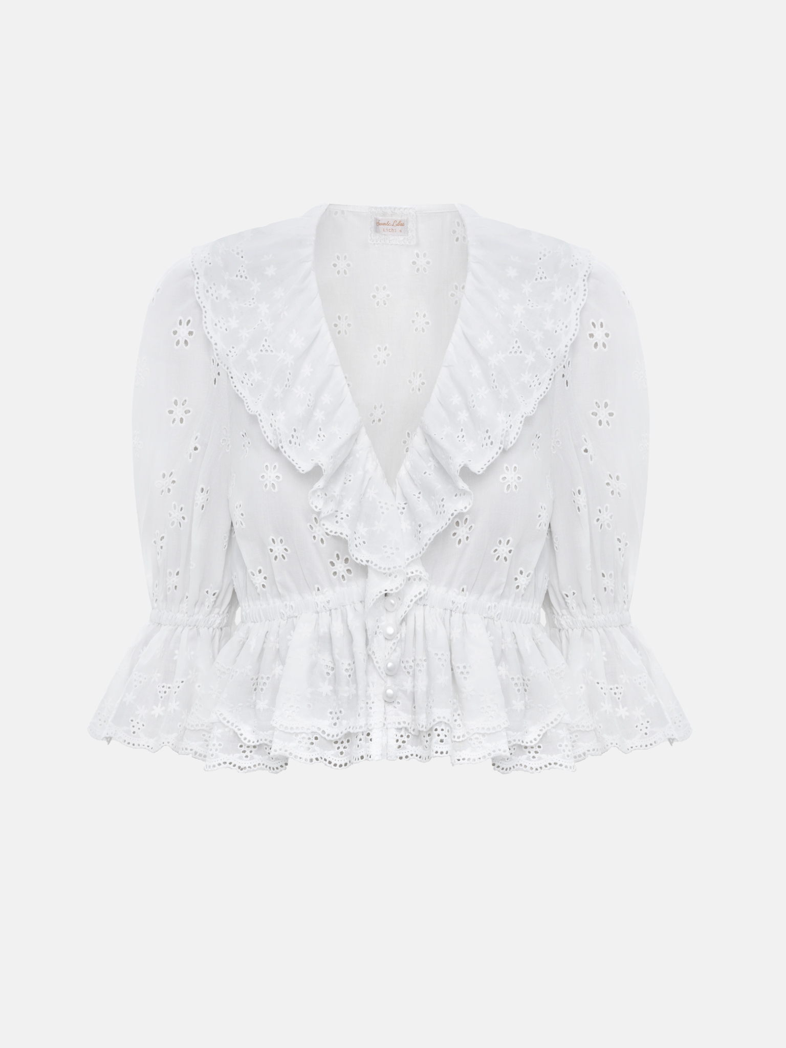 Cotton blouse with ruffles and a floral pattern