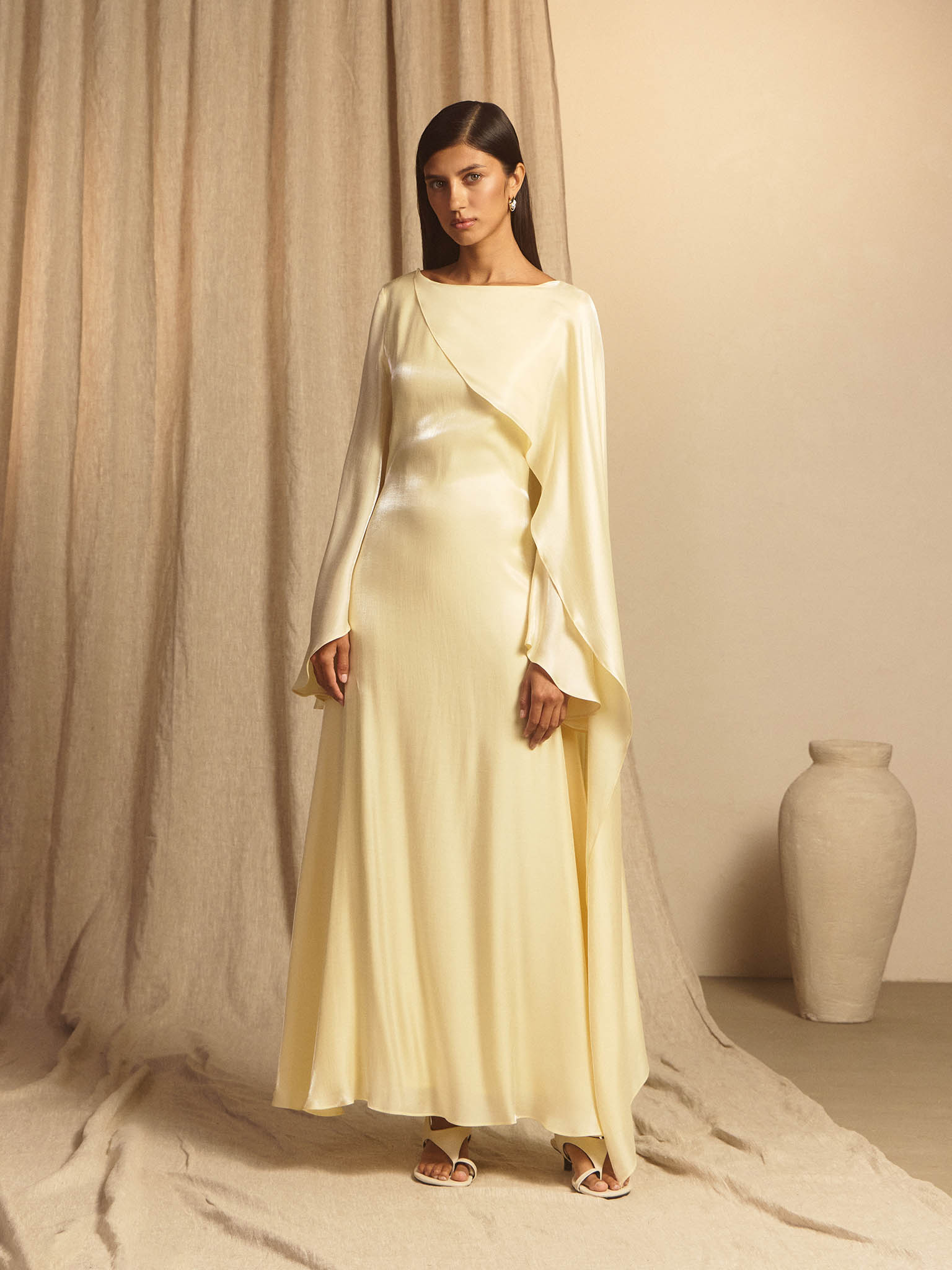 Textured maxi dress with one shoulder cape