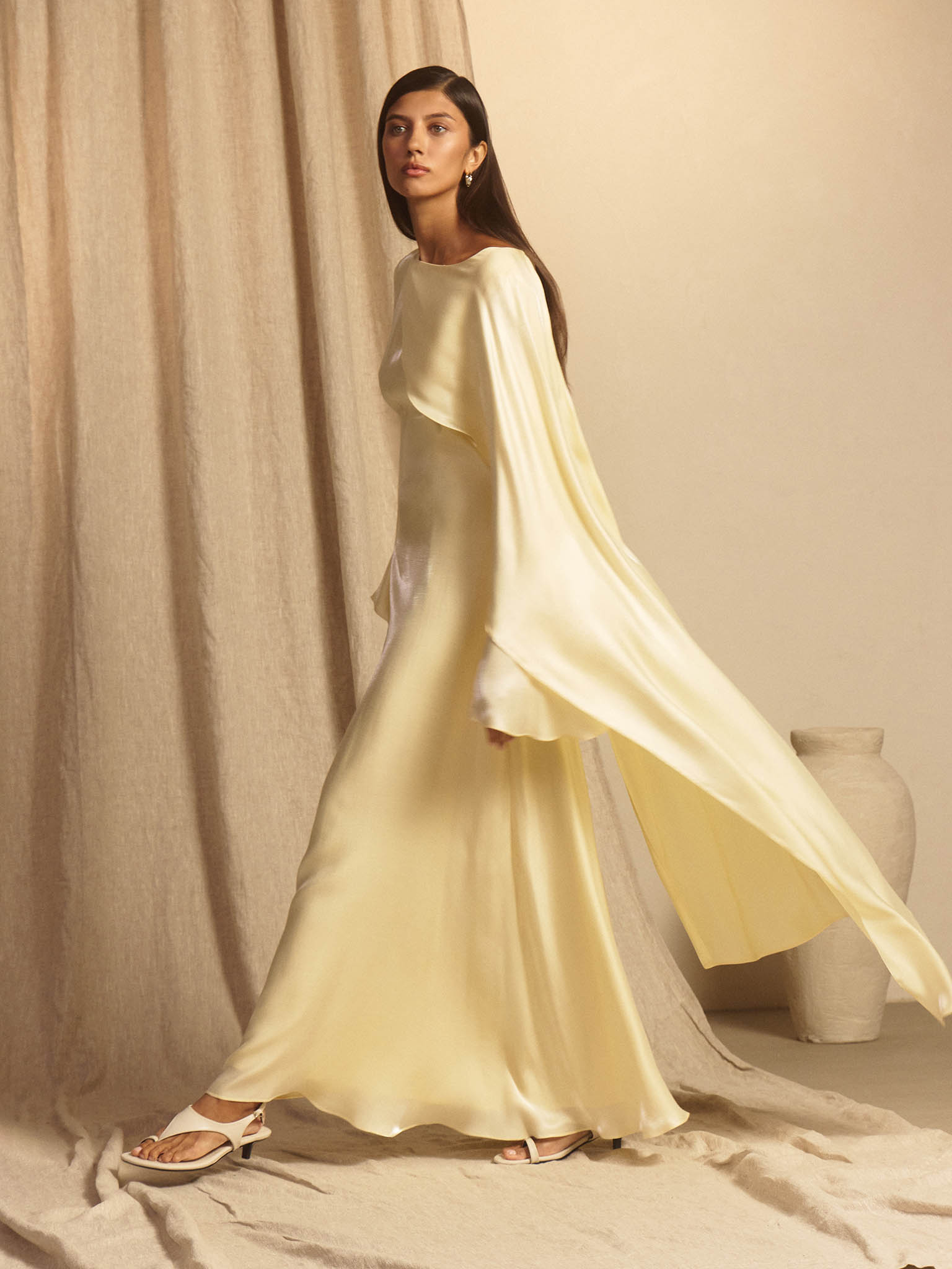 Textured maxi dress with one shoulder cape