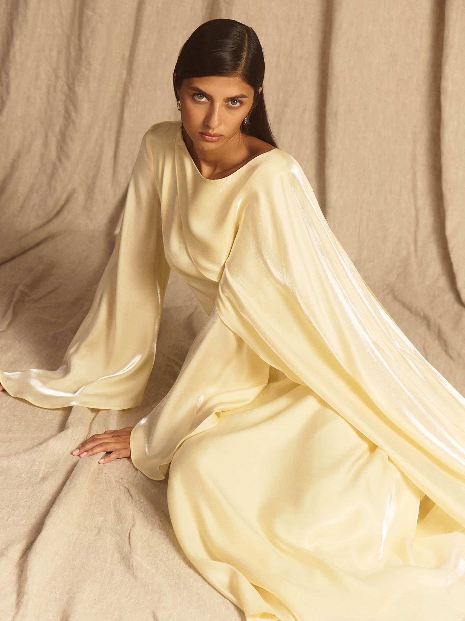 Textured maxi dress with one shoulder cape