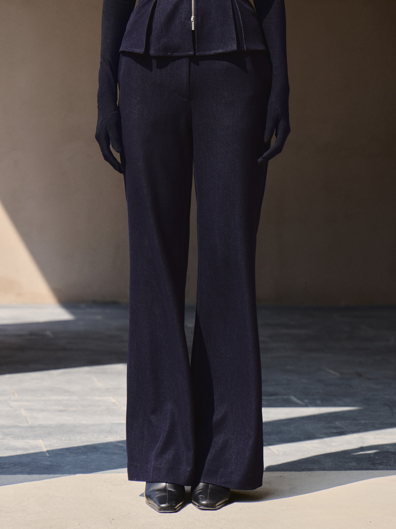 Flared high-waisted trousers