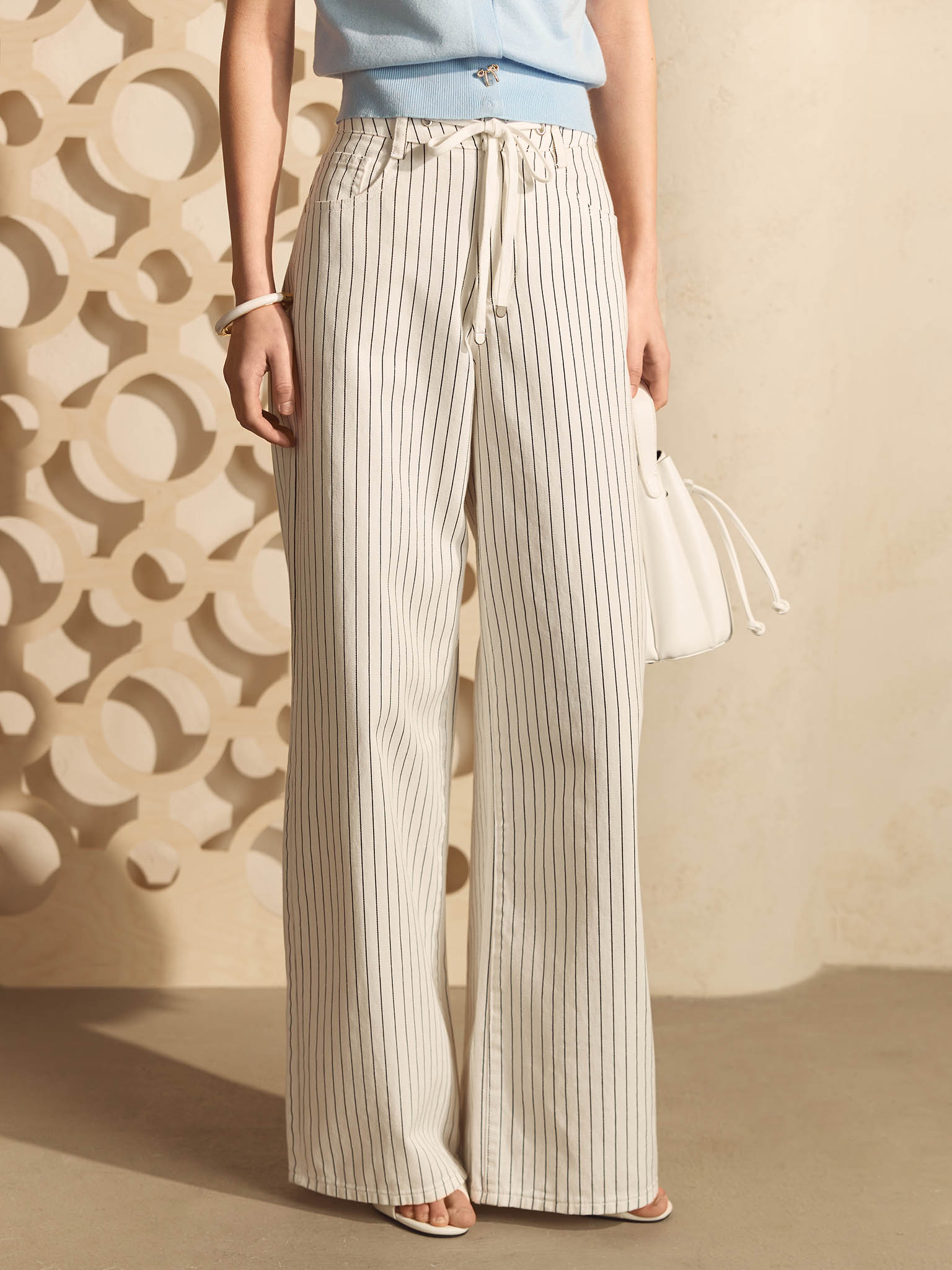 Relaxed striped jeans with waist ties