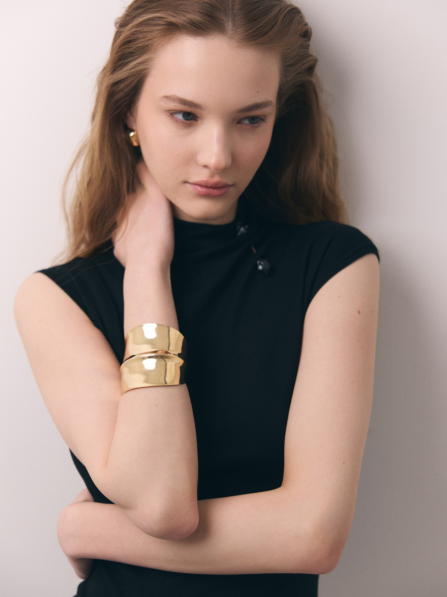 Wide curved metal bracelet