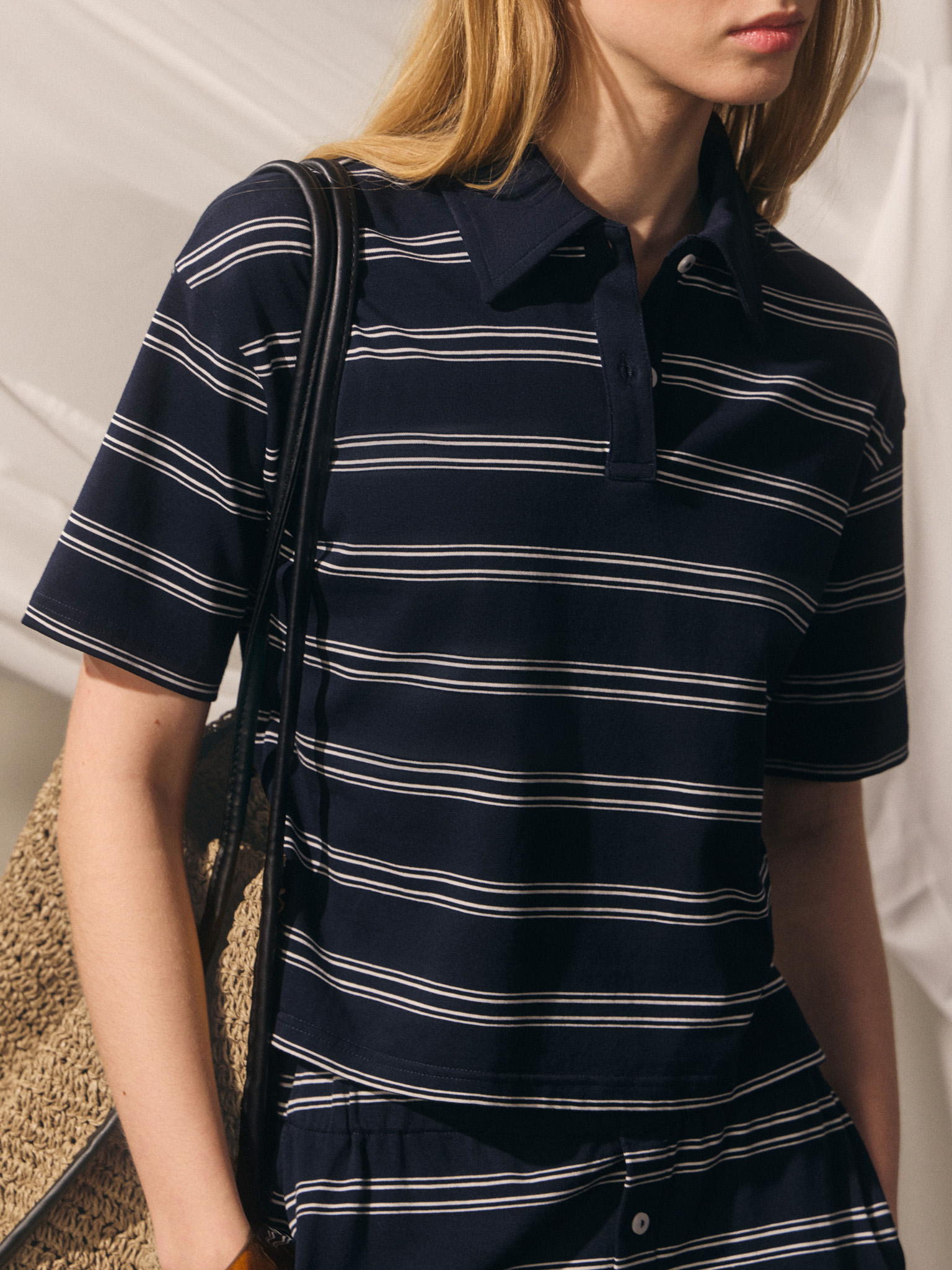 Loose-fitting cotton polo shirt with contrasting stripes