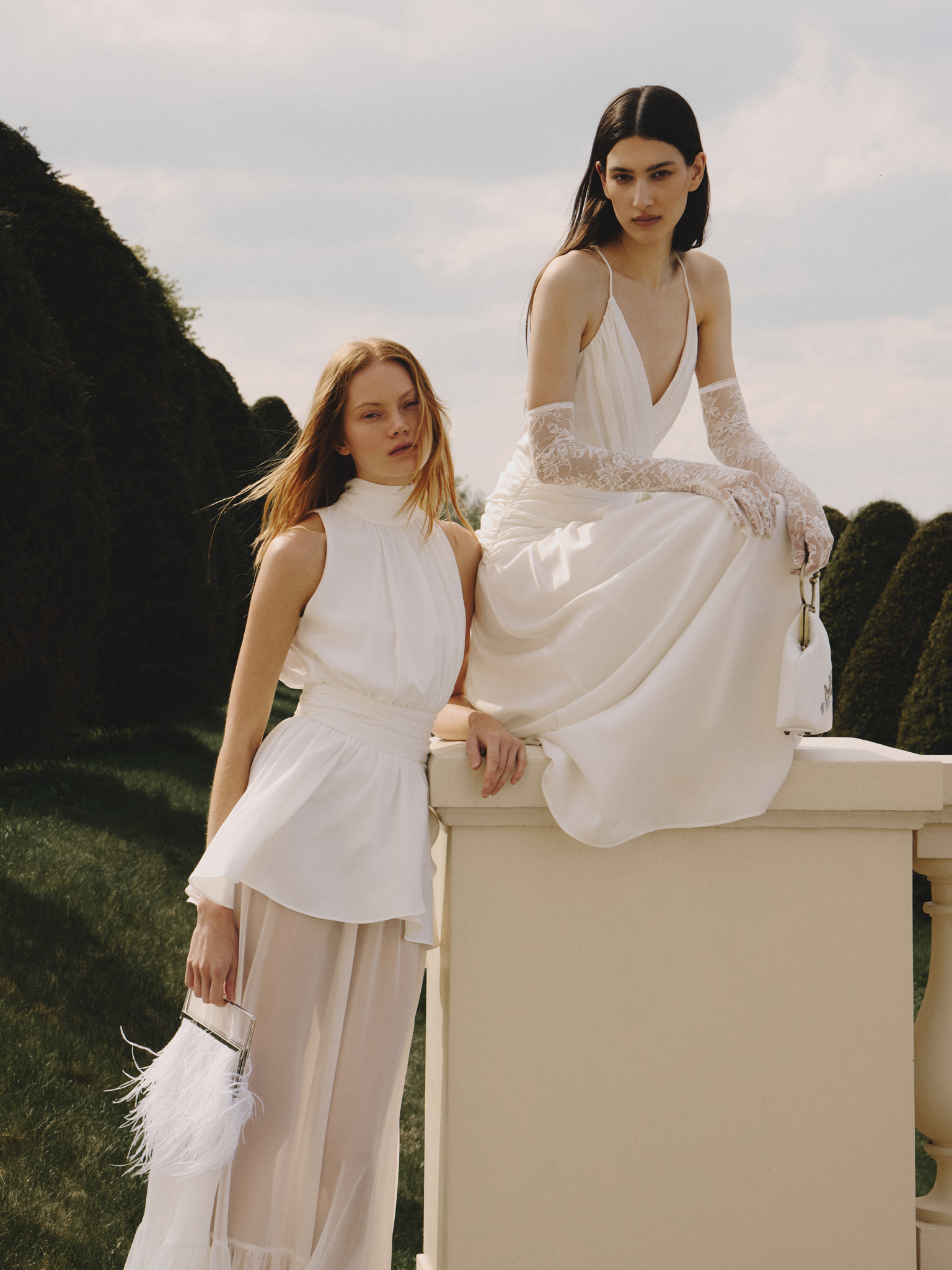 Maxi dress with ribbons on the bodice and a semi-sheer skirt