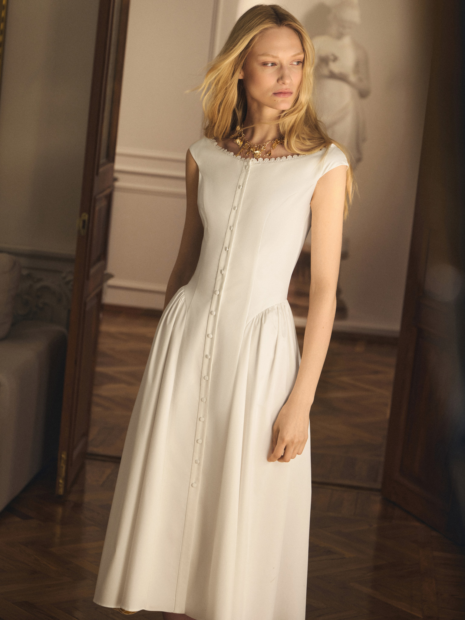 Midi dress with oval neckline and voluminous skirt