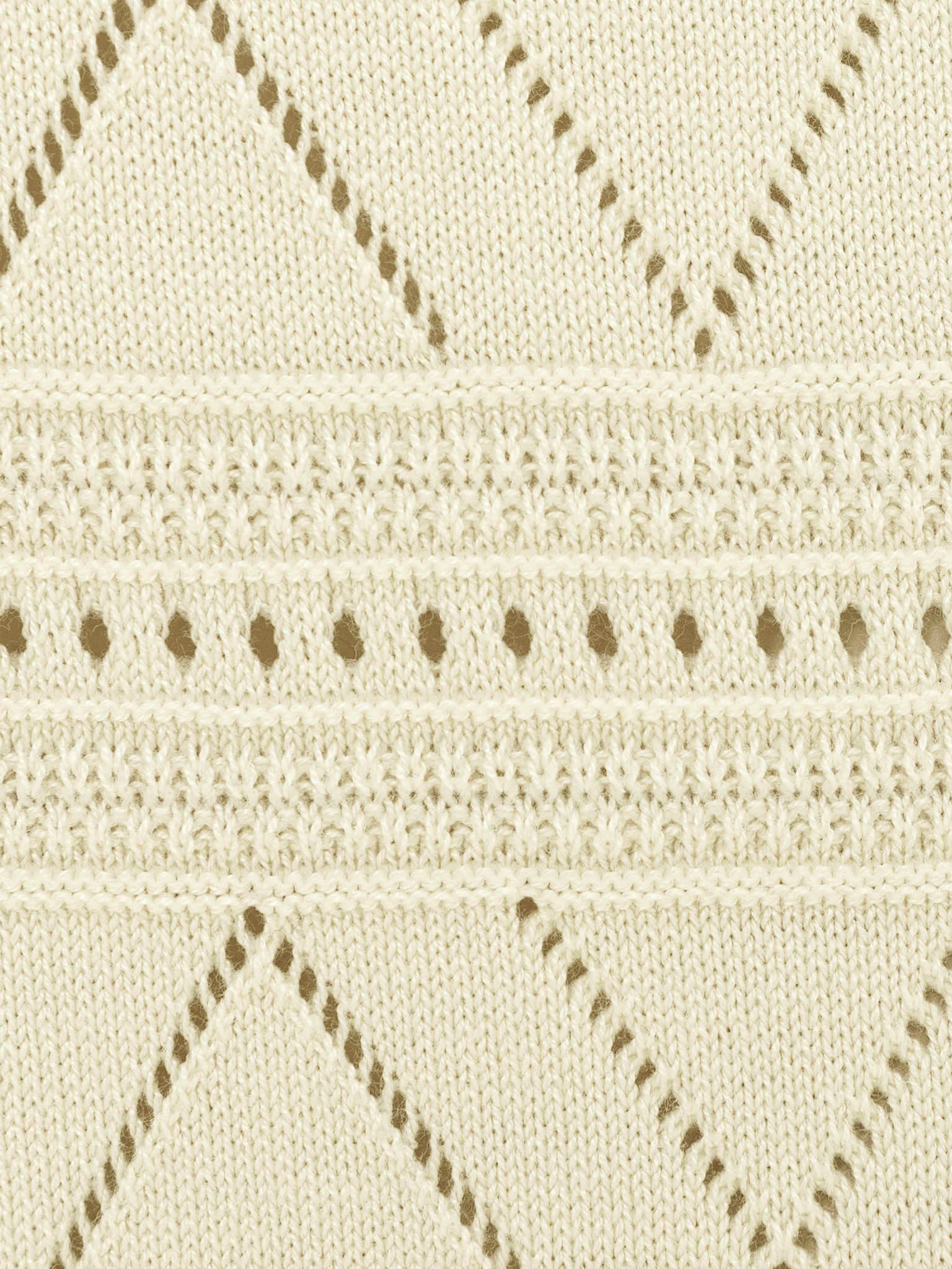 Knitted trousers with geometric pattern