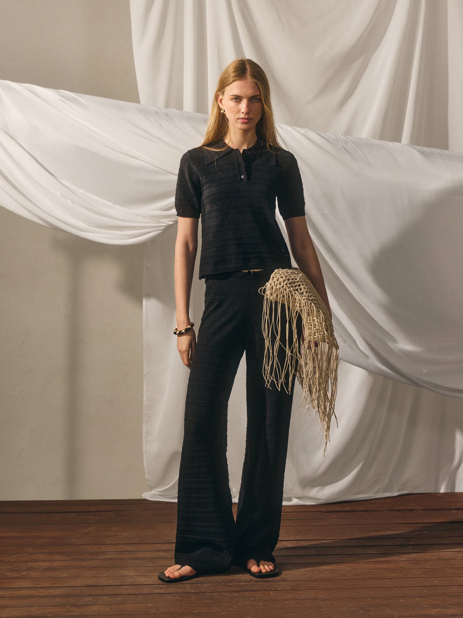Knitted trousers with geometric pattern