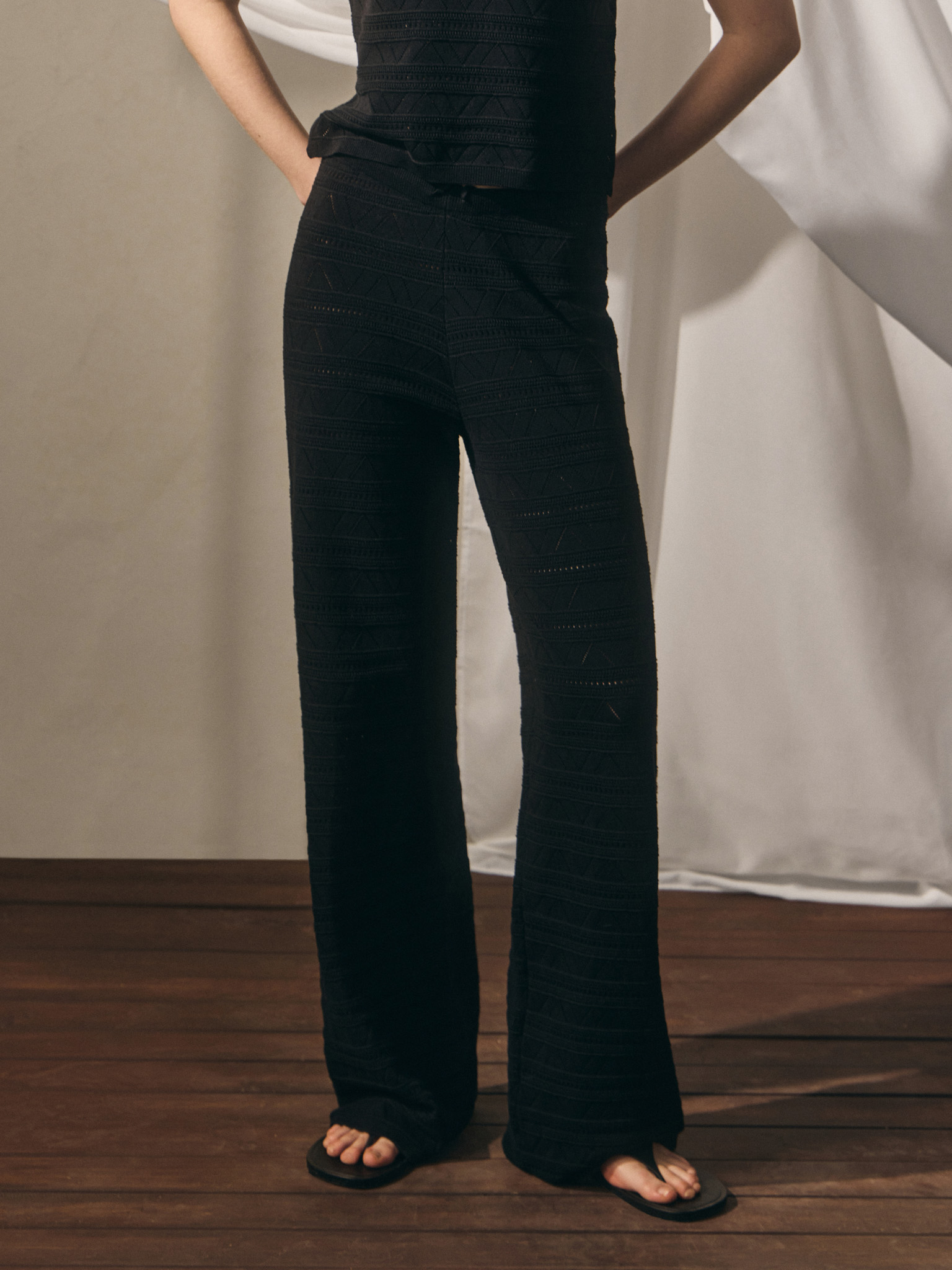 Knitted trousers with geometric pattern