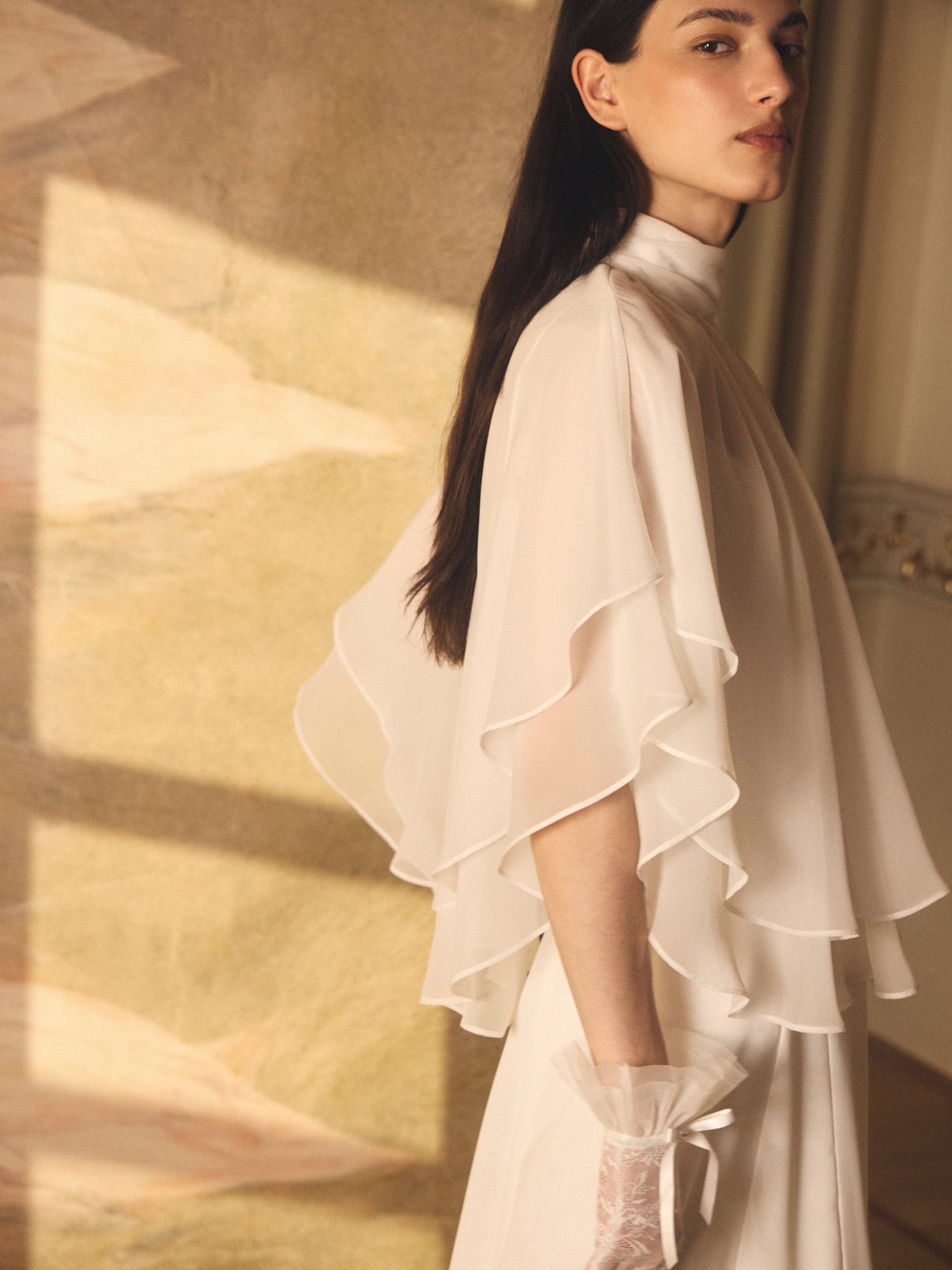 Maxi dress with a layered semi-transparent cape