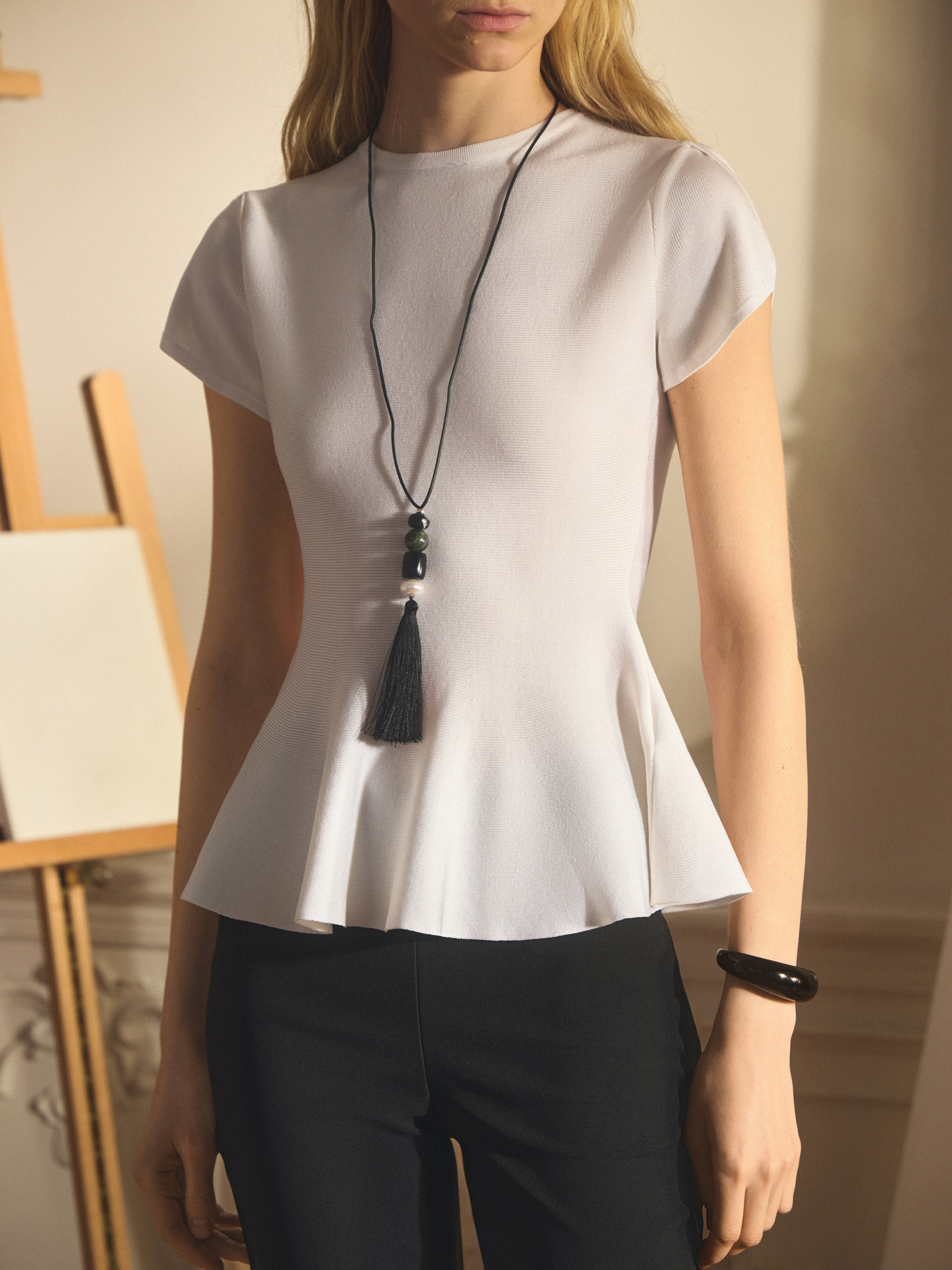 Viscose top with short sleeves and peplum at the waist