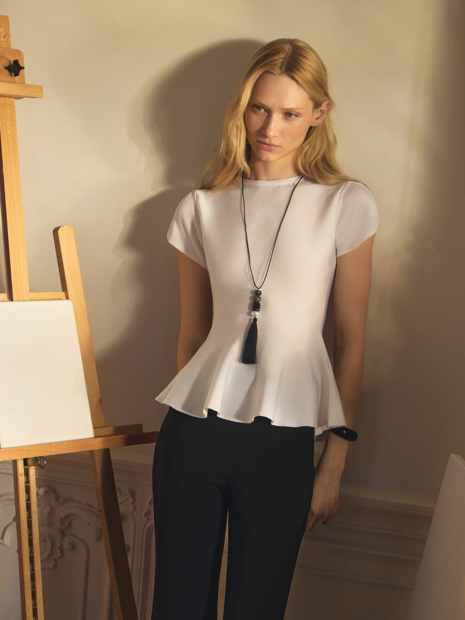Viscose top with short sleeves and peplum at the waist