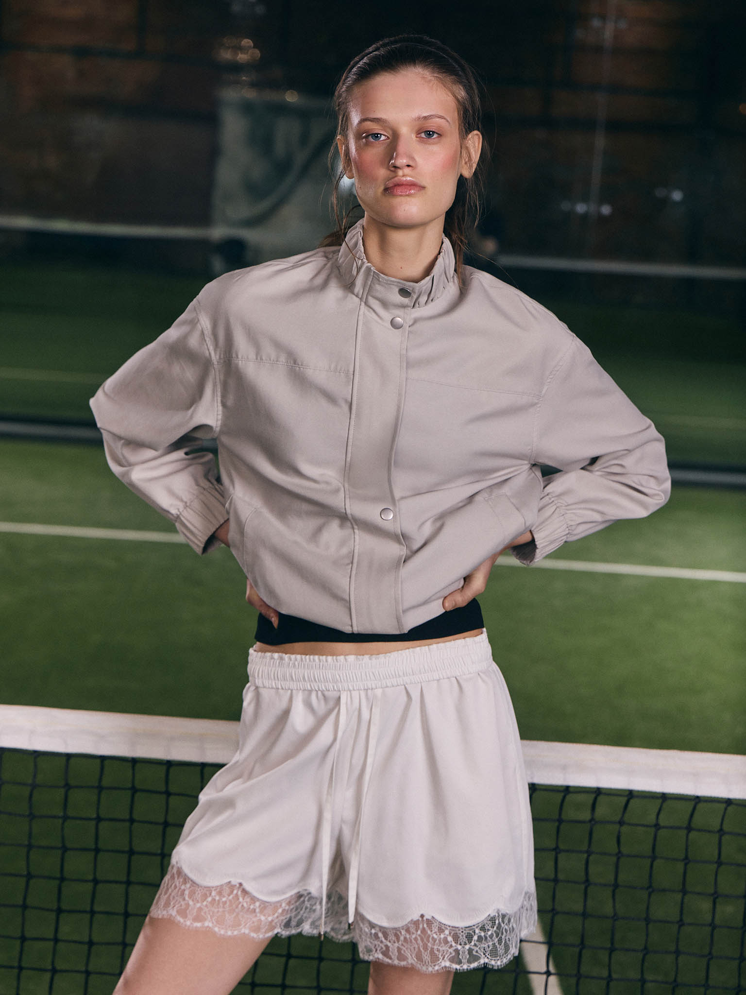 Sports jacket with press stud fastening