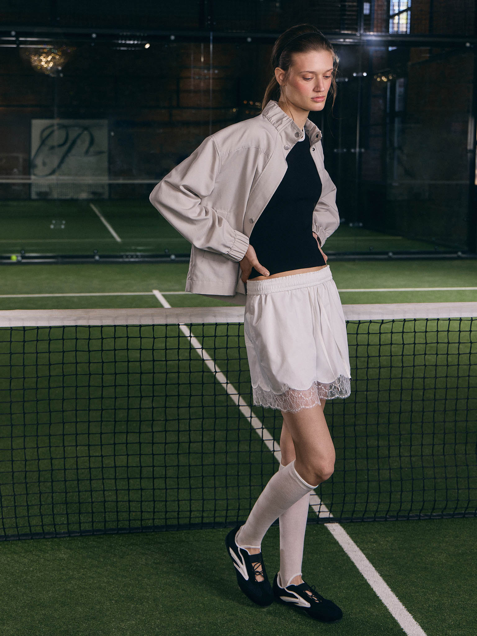 Sports jacket with press stud fastening