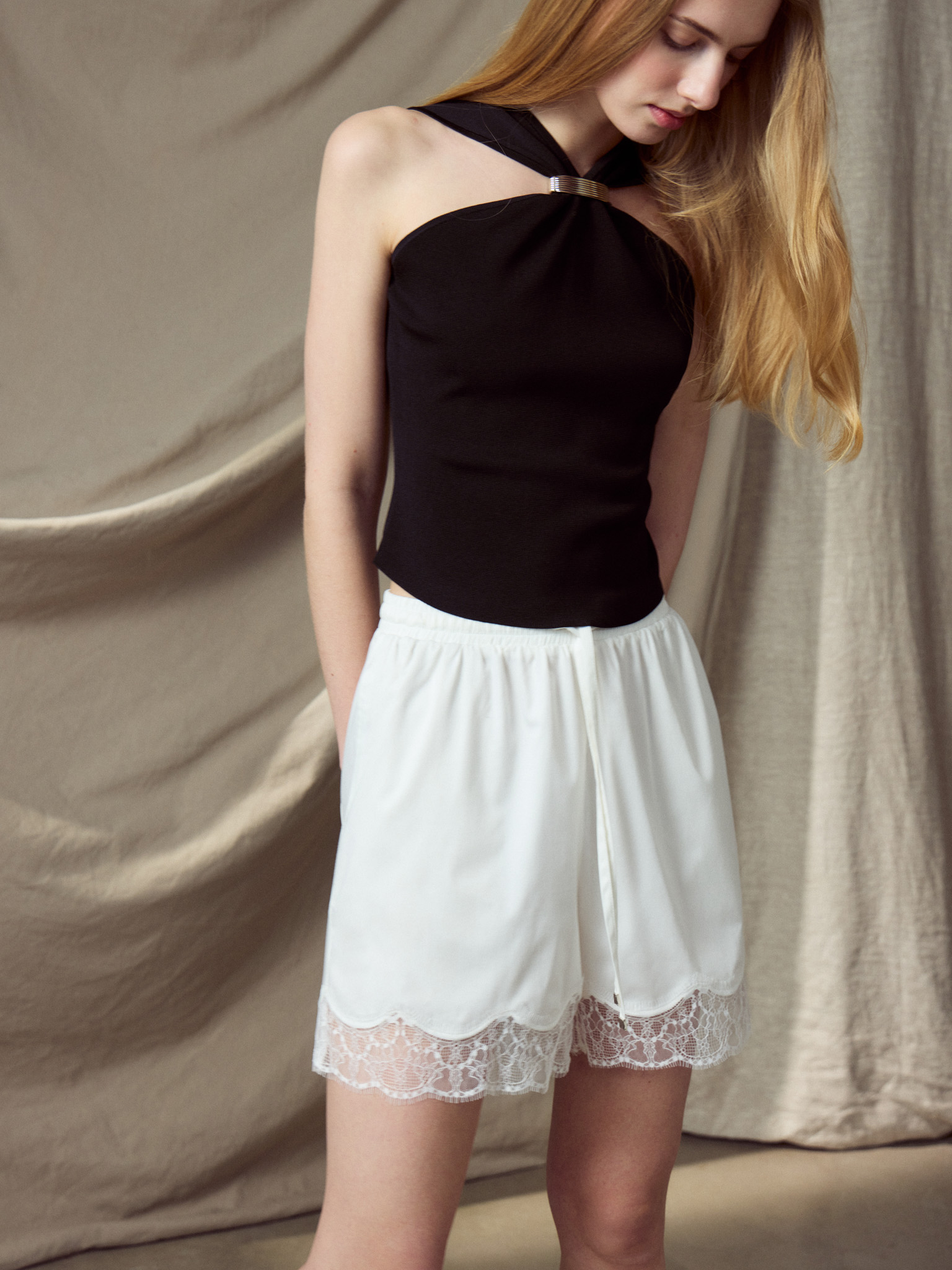 Satin mini shorts with lace cuffs