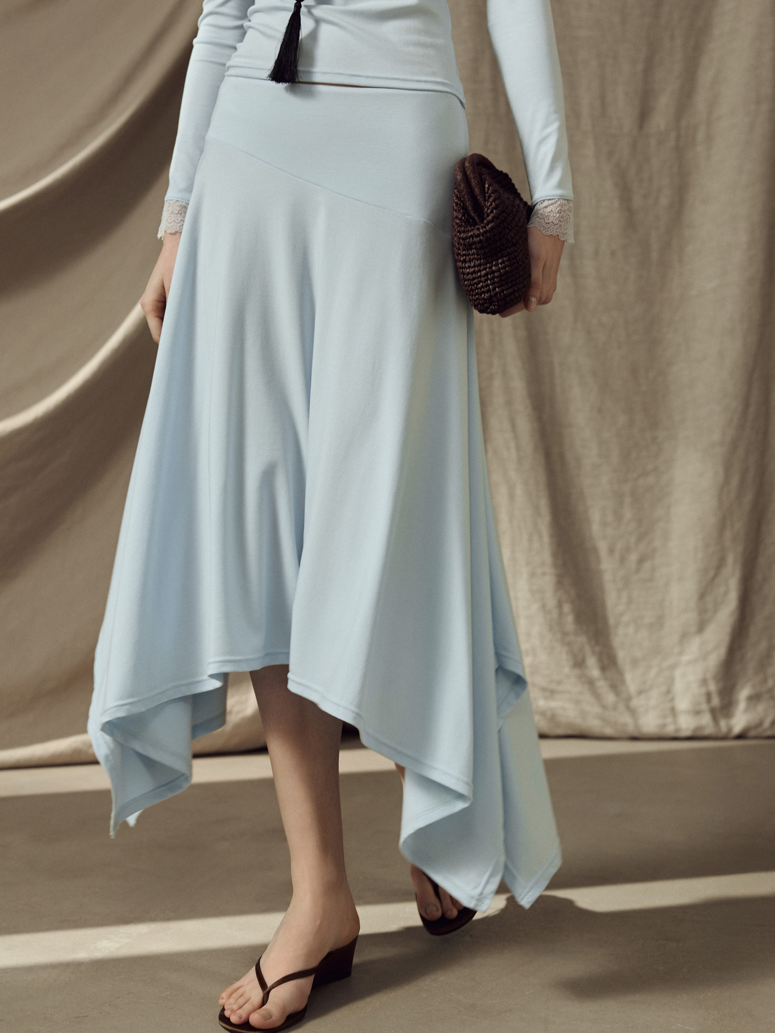 Jersey midi skirt with an asymmetrical hem