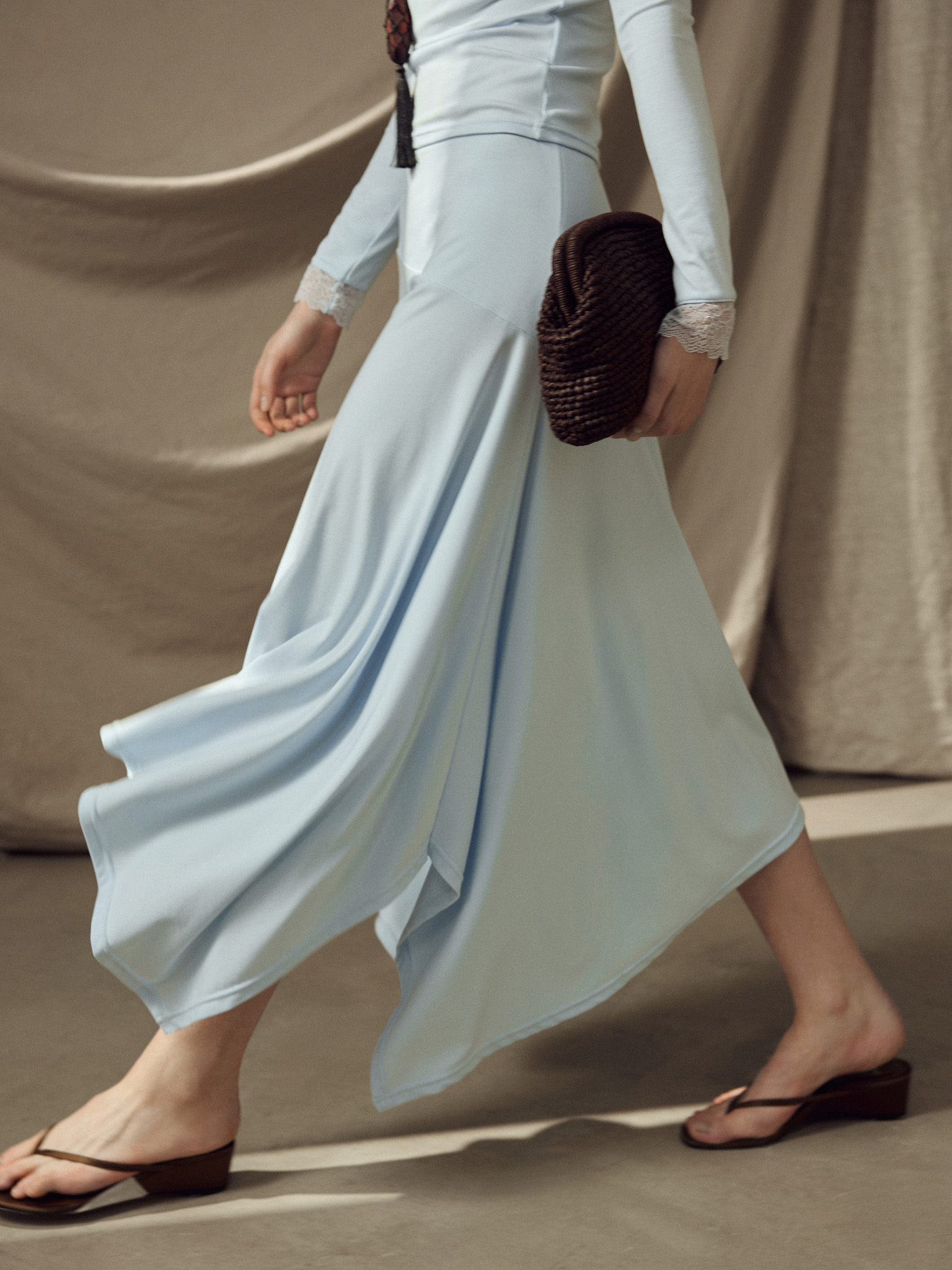 Jersey midi skirt with an asymmetrical hem