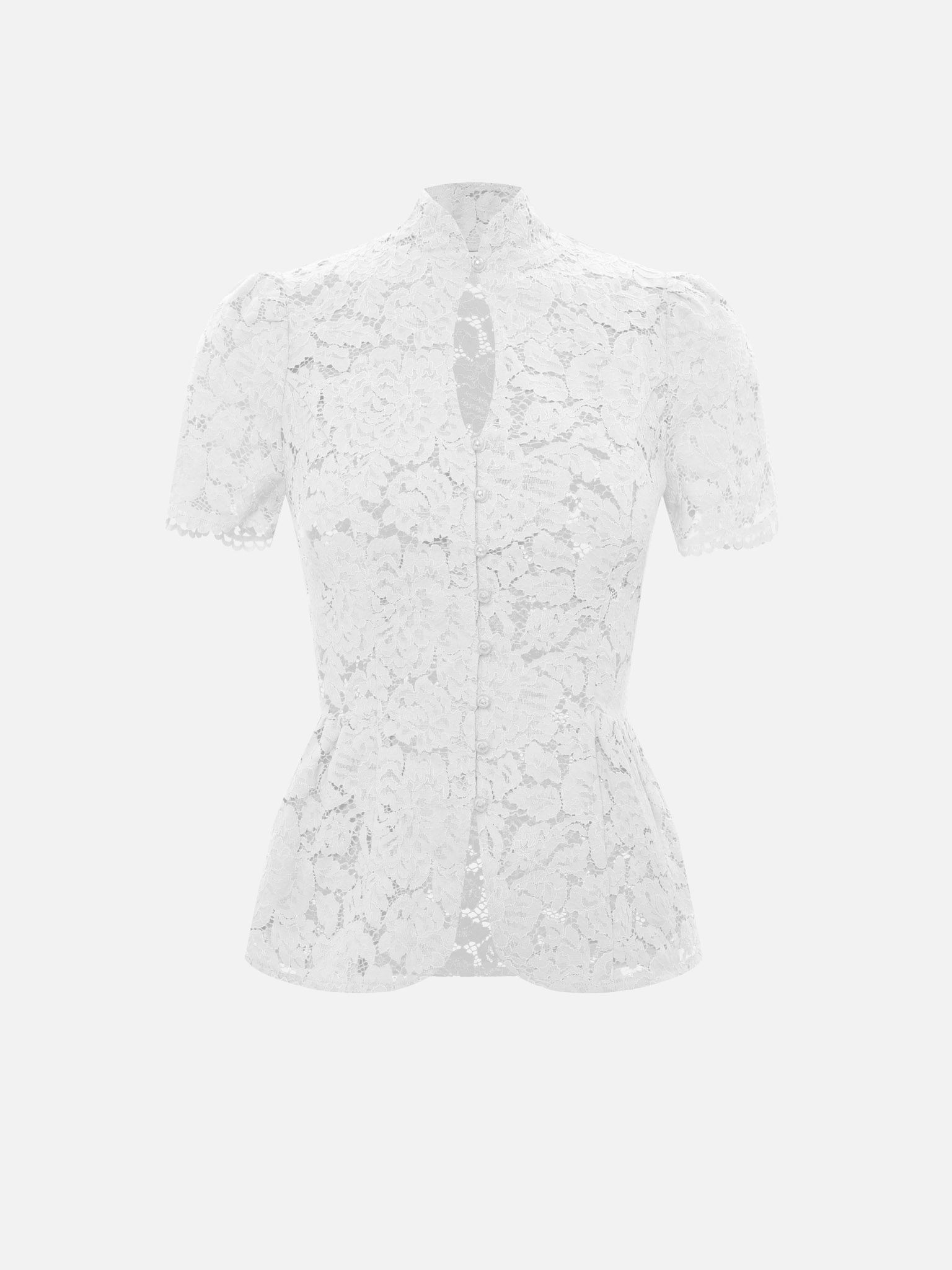 Blouse ajustée en guipure, avec encolure en goutte d'eau et basque