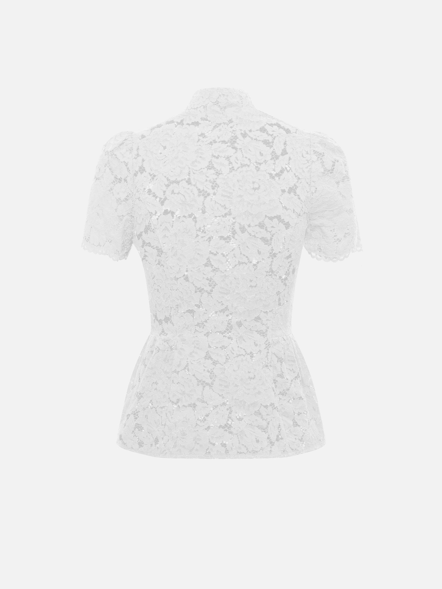Blouse ajustée en guipure, avec encolure en goutte d'eau et basque