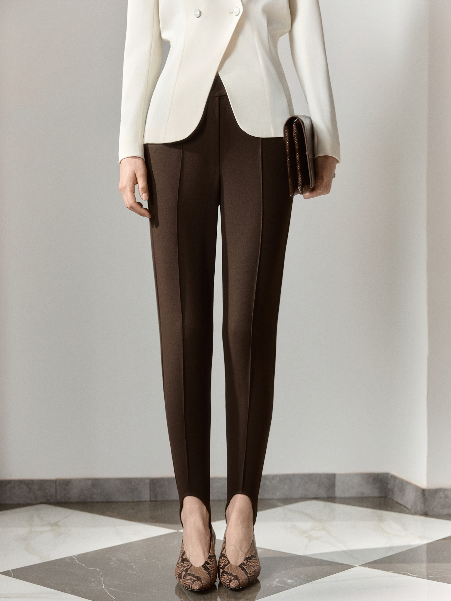 Slim-fit trousers with straps