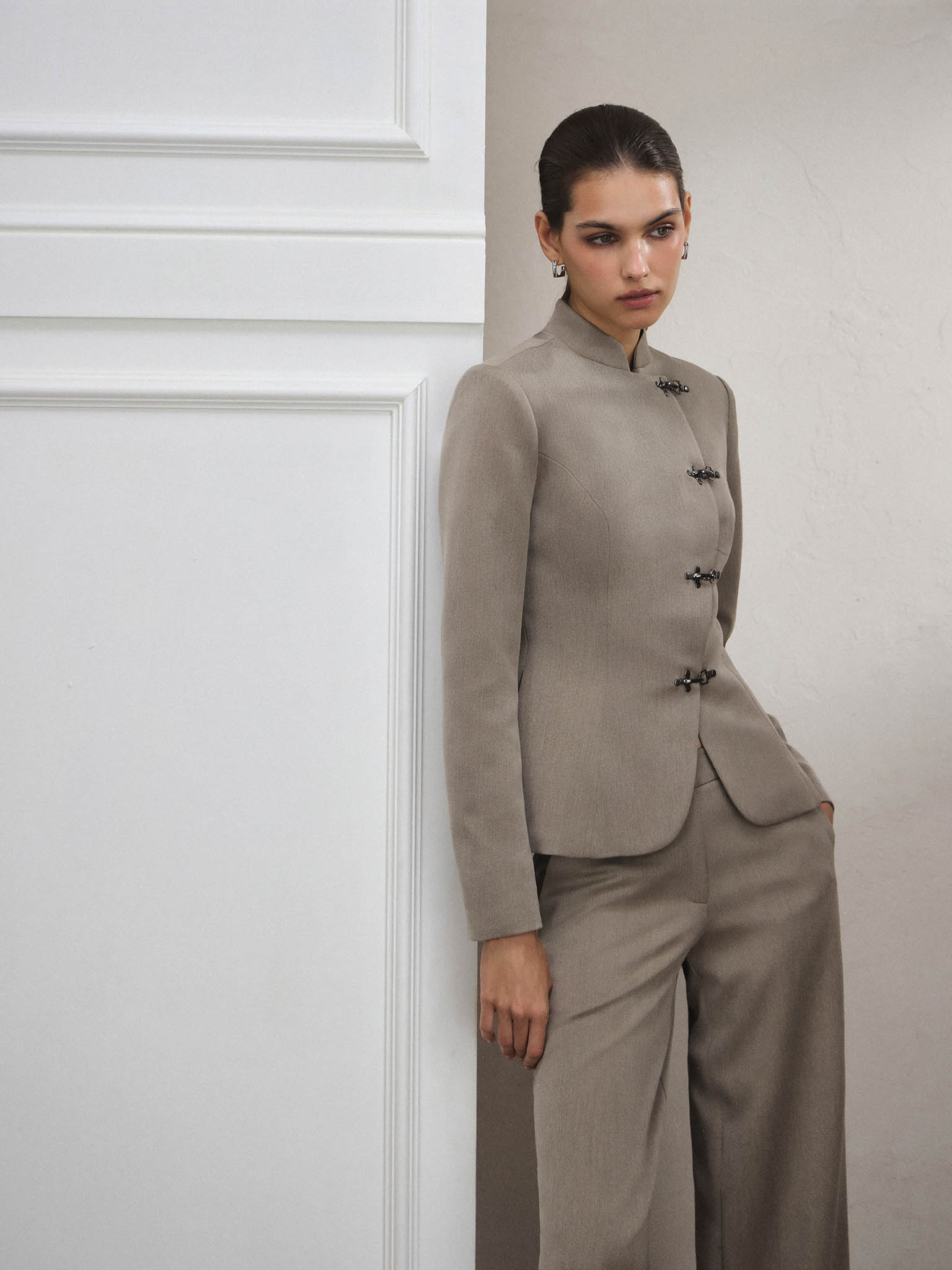 Fitted jacket with Asian-style fastenings